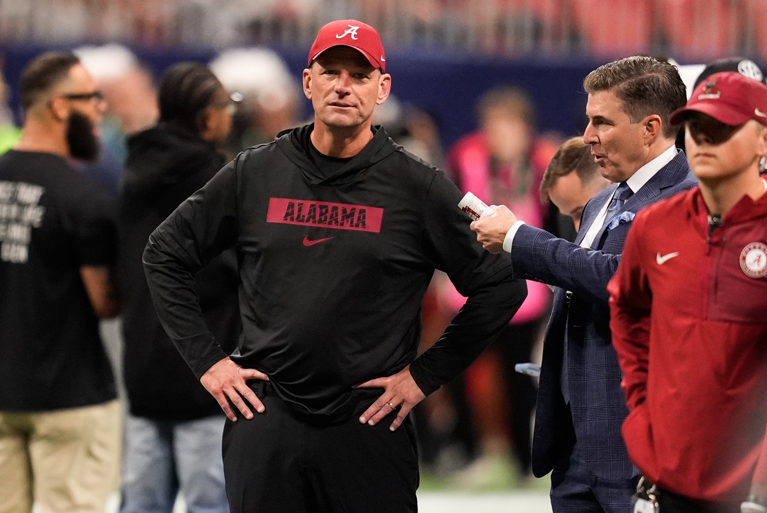 Dec 6, 2025; Atlanta, GA, USA; Alabama Crimson Tide head coach Kalen Deboer looks on before the game against the Georgia Bulldogs during the 2025 SEC Championship game at Mercedes-Benz Stadium