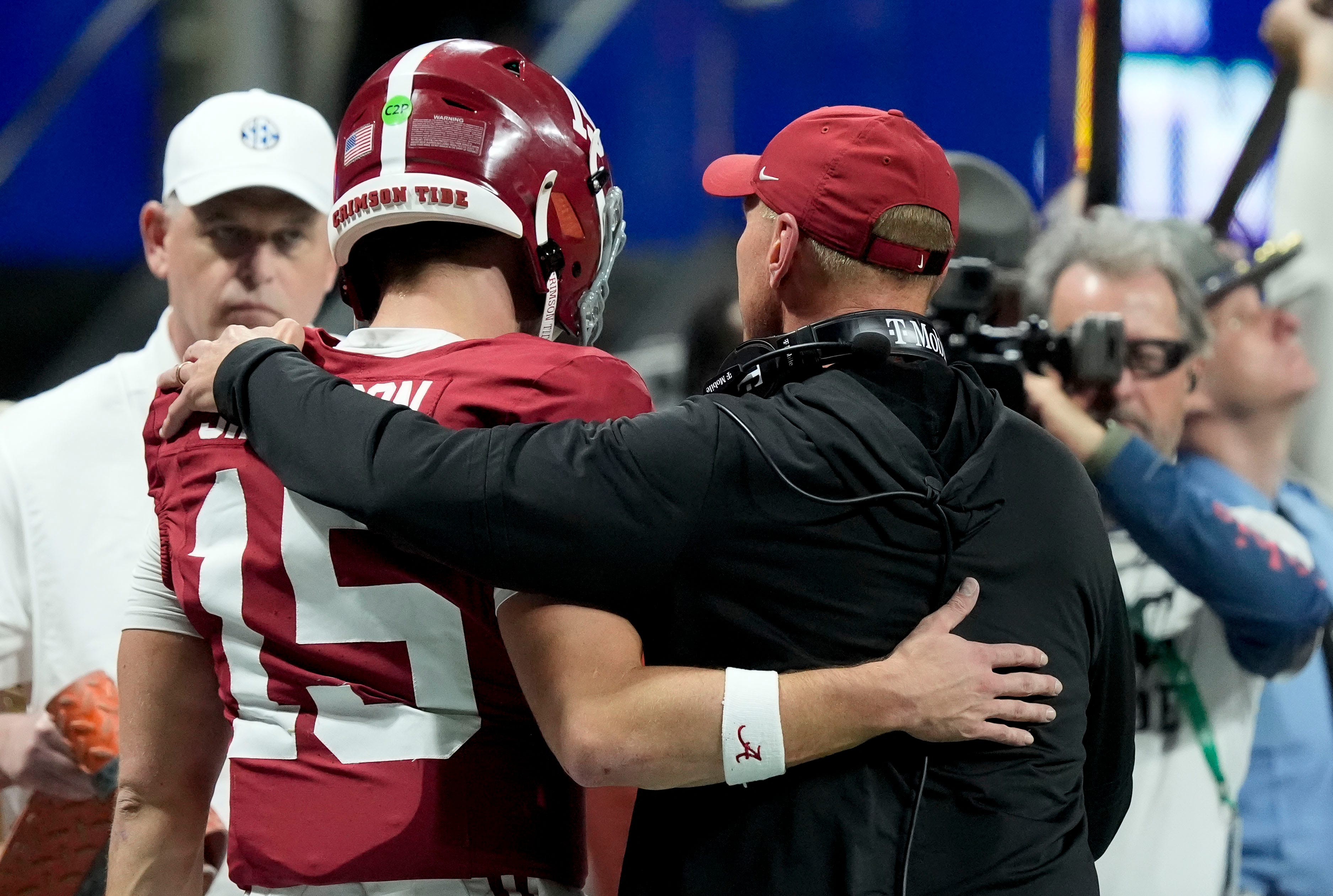 Dec 6, 2025; Atlanta, GA, USA; Alabama head coach Kalen DeBoer embraces Alabama quarterback Ty Simpson (15) after Alabama’s only touchdown against Georgia at Mercedes-Benz Stadium.