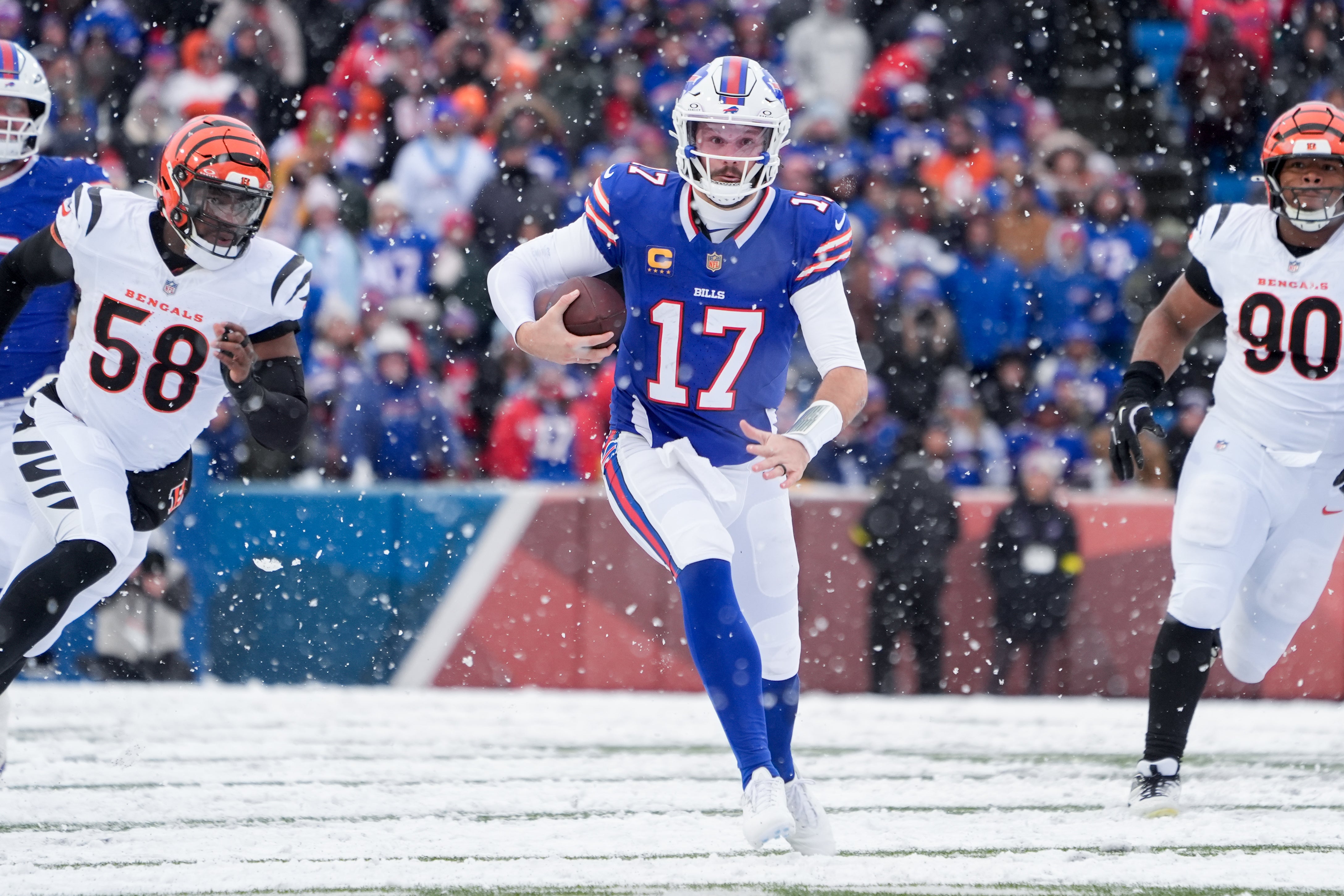 Dec 7, 2025; Orchard Park, New York, USA; Buffalo Bills quarterback Josh Allen (17) runs with the ball in the third quarter against the Cincinnati Bengals at Highmark Stadium.