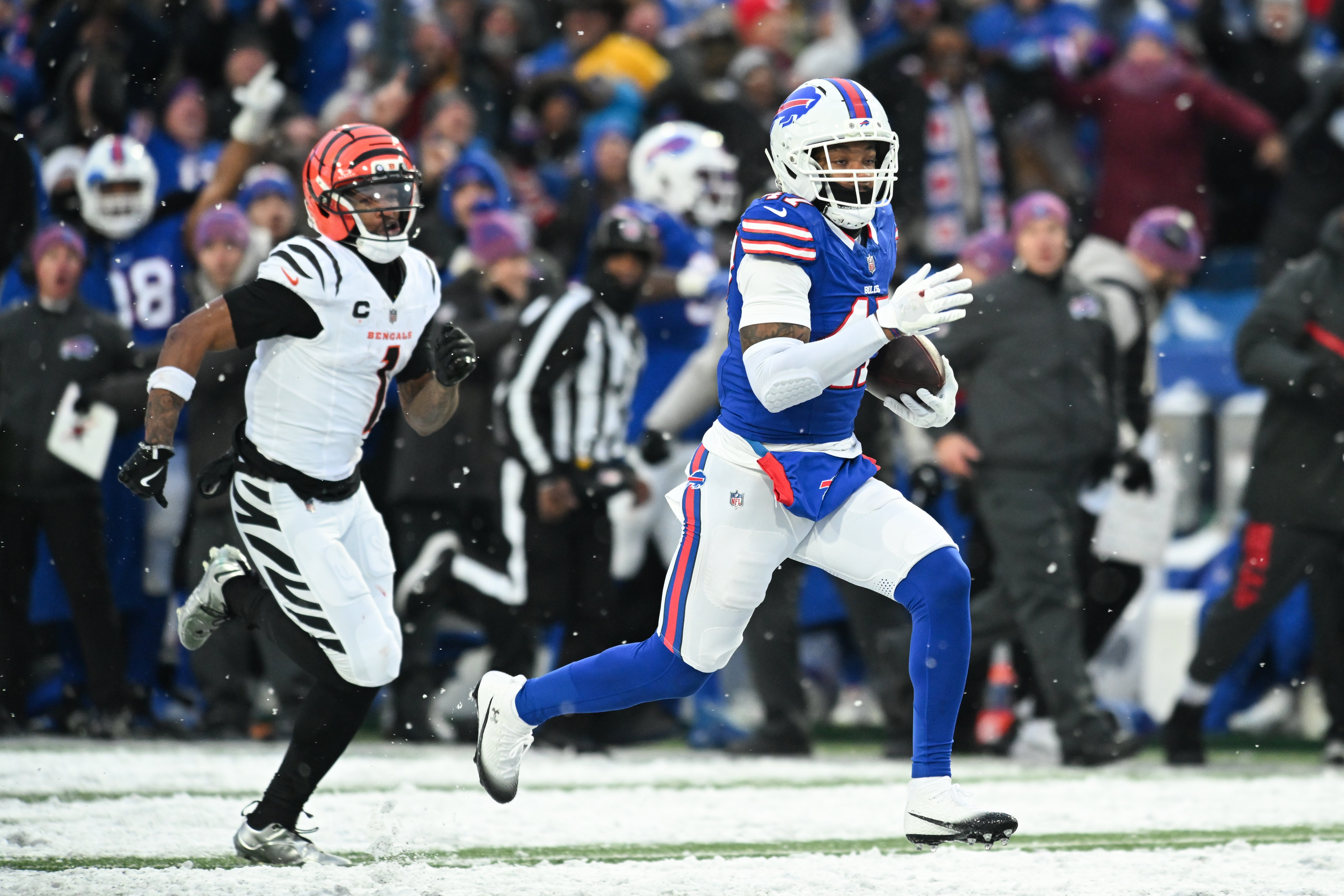 Dec 7, 2025; Orchard Park, New York, USA; Buffalo Bills cornerback Christian Benford (47) runs the ball for a touchdown after an interception against the Cincinnati Bengals in the fourth quarter at Highmark Stadium.