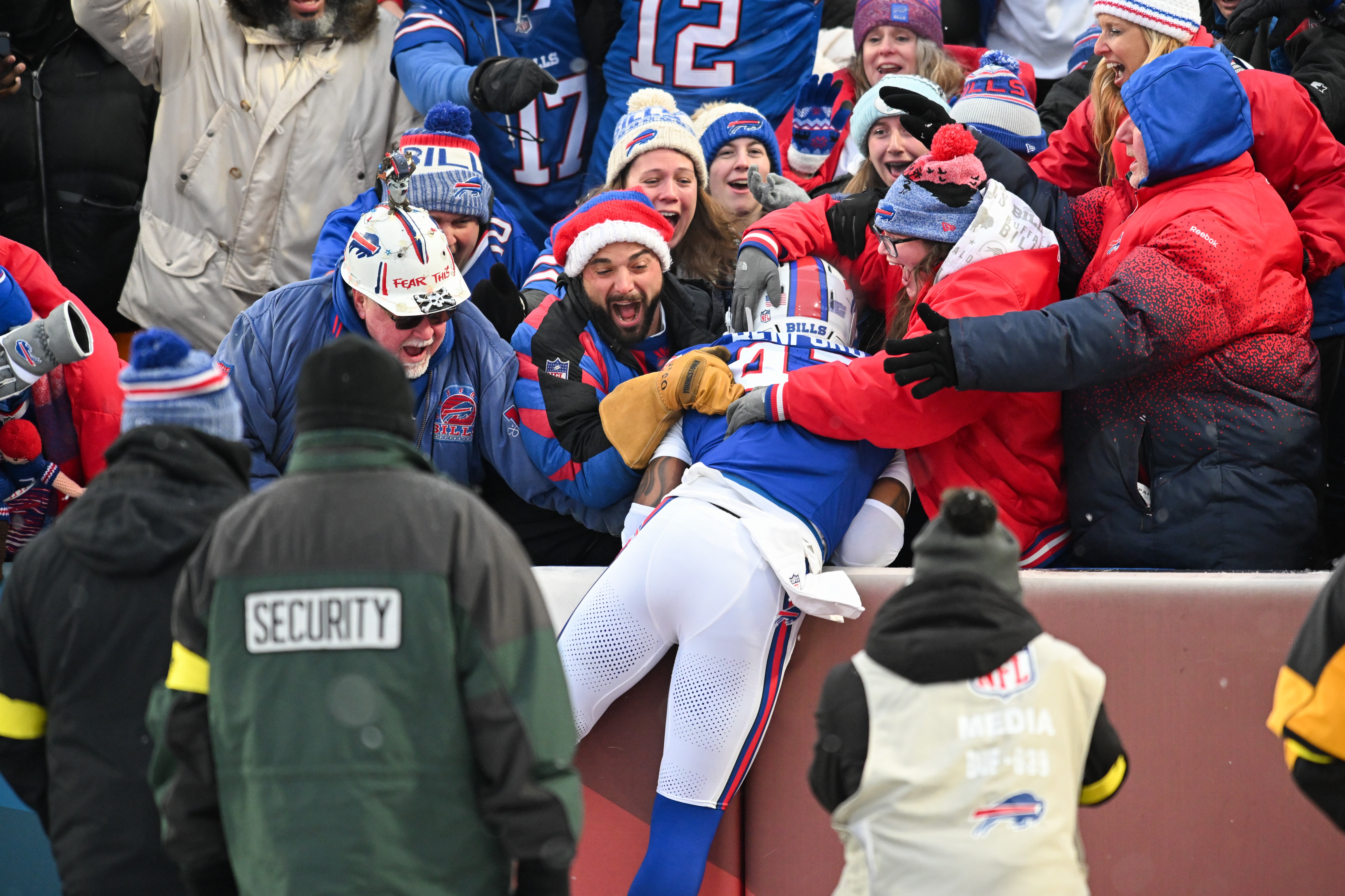 Dec 7, 2025; Orchard Park, New York, USA; Buffalo Bills cornerback Christian Benford (47) celebrates a pick six touchdown with fans during the fourth quarter against the Cincinnati Bengals at Highmark Stadium.