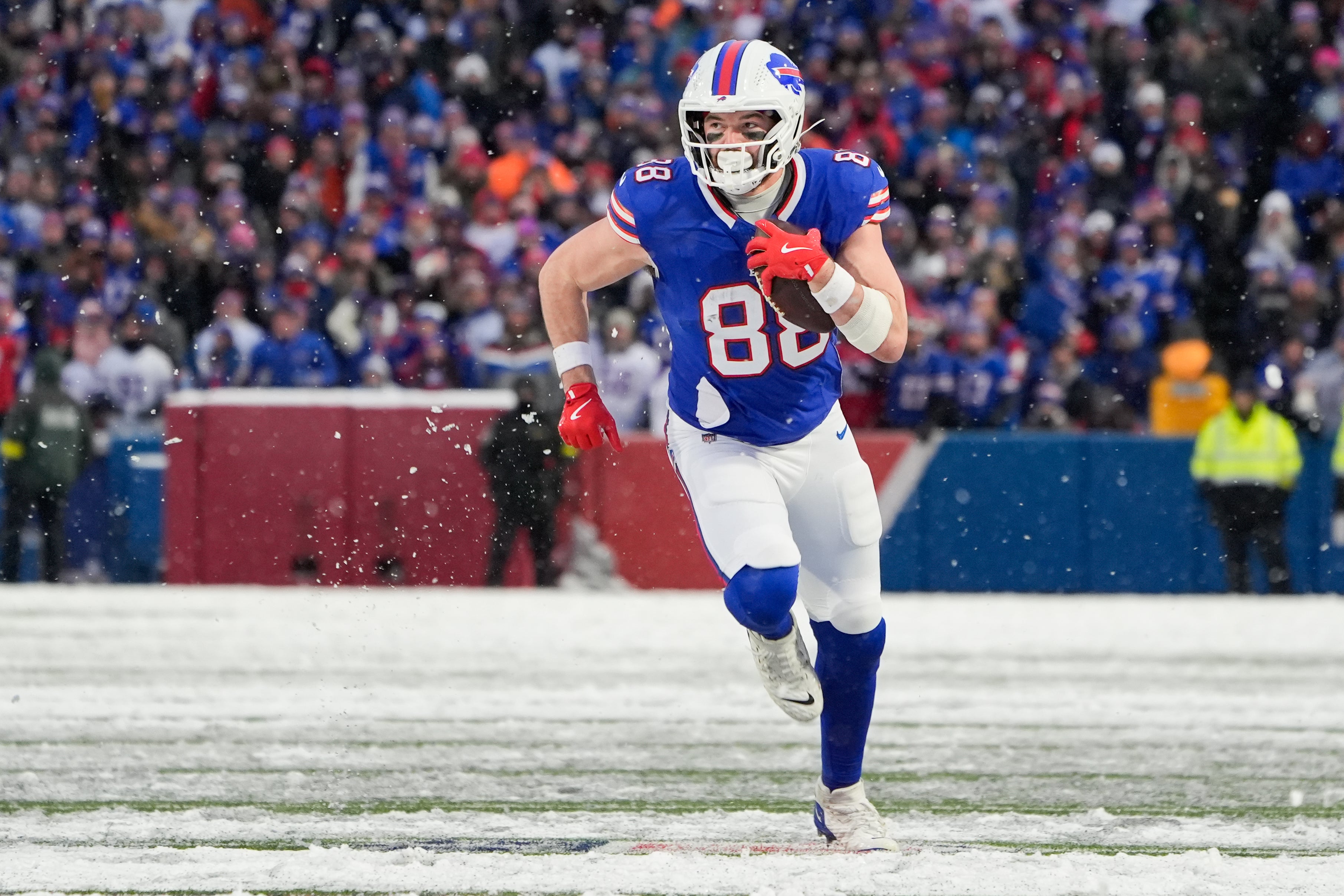 Dec 7, 2025; Orchard Park, New York, USA; Buffalo Bills tight end Dawson Knox (88) runs with the ball in the fourth quarter against the Cincinnati Bengals at Highmark Stadium.