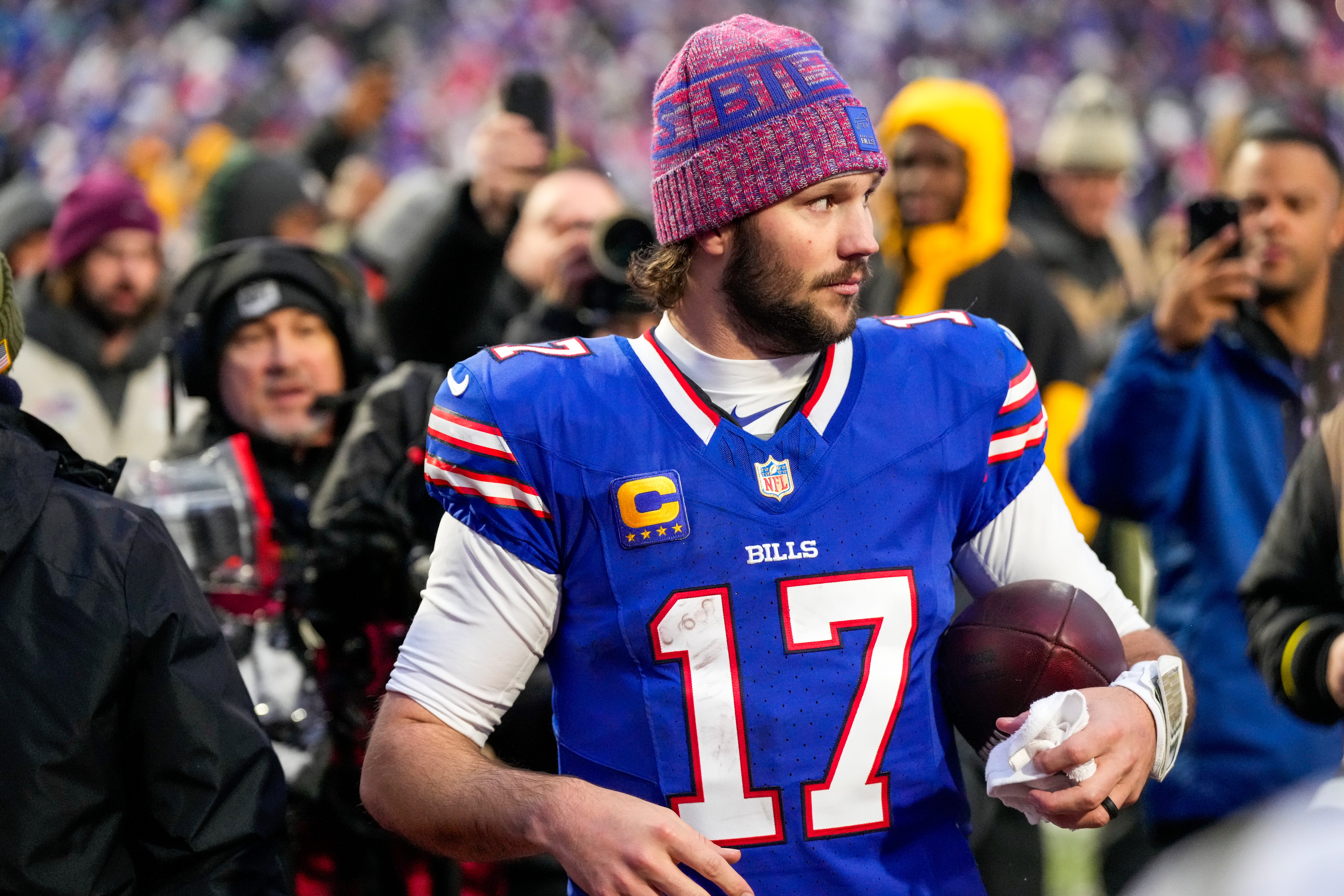 Buffalo Bills quarterback Josh Allen (17) walks off the field after the fourth quarter of the NFL Week 14 game between the Buffalo Bills and the Cincinnati Bengals at Highmark Stadium in Orchard Park, N.Y., on Sunday, Dec. 7, 2025. The Bills overcame a halftime deficit to win 39-34.