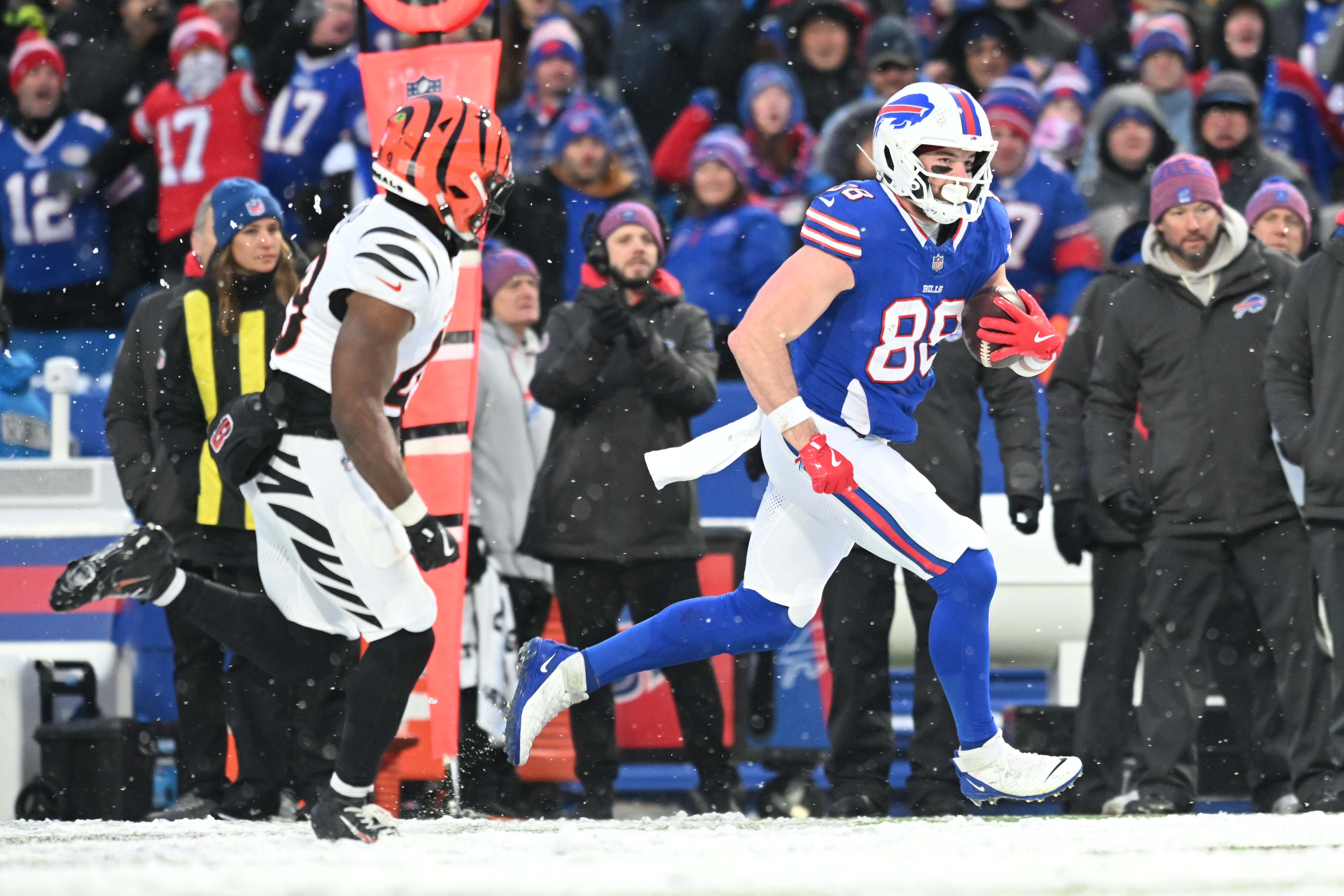 Dec 7, 2025; Orchard Park, New York, USA; Buffalo Bills tight end Dawson Knox (88) runs with the ball in the second half against against the Cincinnati Bengals at Highmark Stadium.