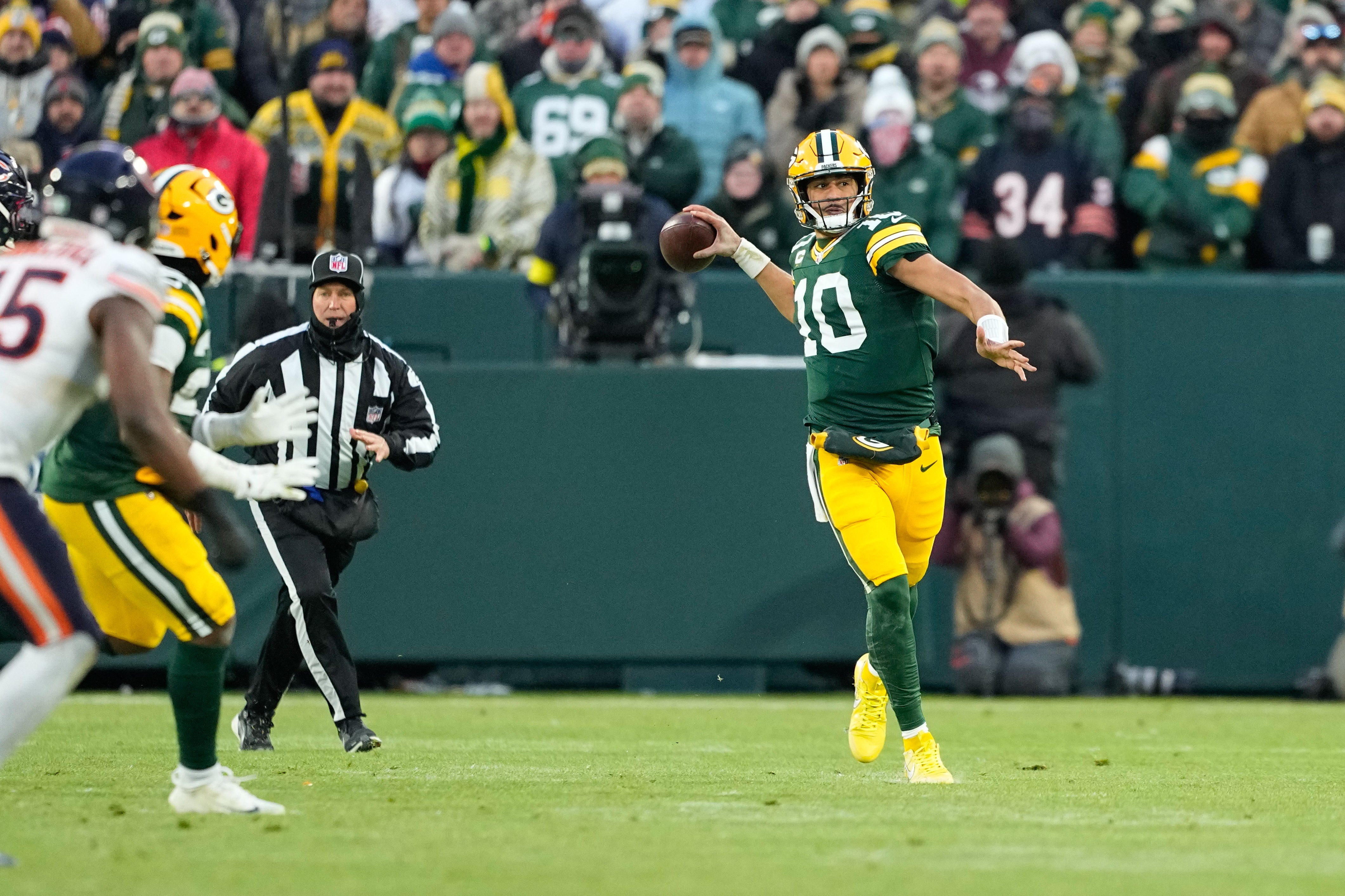 Dec 7, 2025; Green Bay, Wisconsin, USA; Green Bay Packers quarterback Jordan Love (10) throws in the first quarter against the Chicago Bears at Lambeau Field.