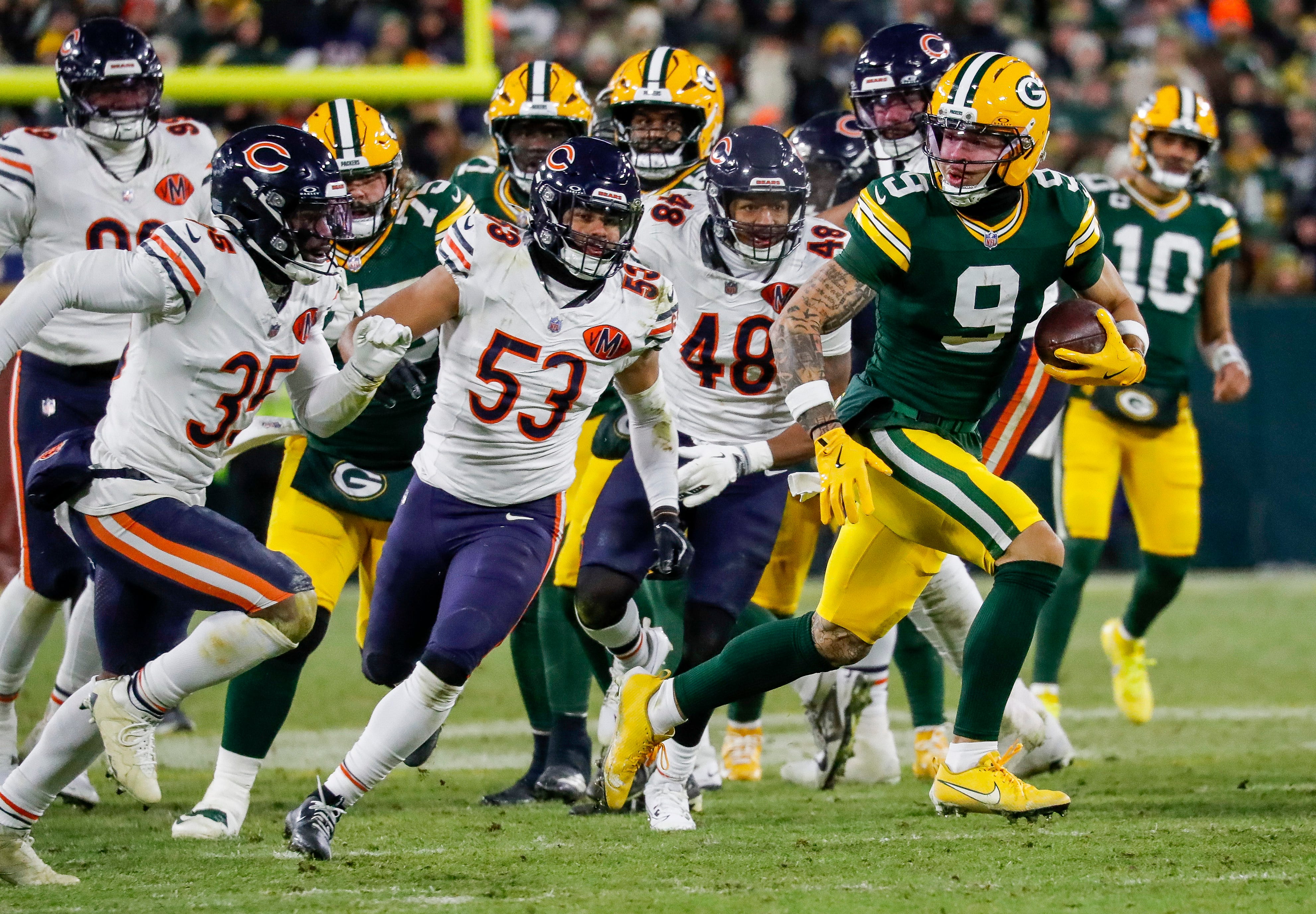 Green Bay Packers wide receiver Christian Watson (9) breaks free for a touchdown reception against the Chicago Bears on Sunday, December 7, 2025, at Lambeau Field in Green Bay, Wis.
