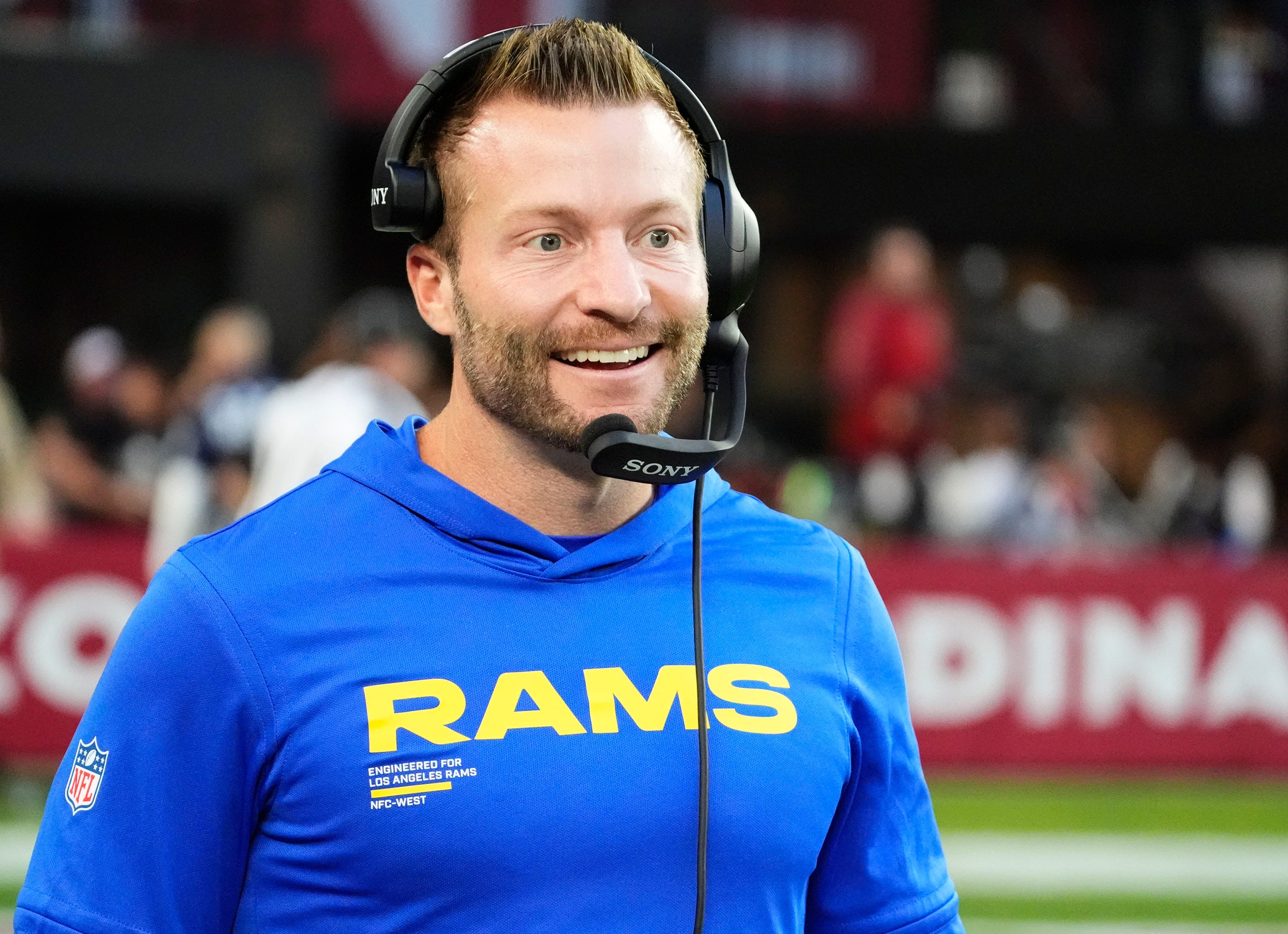 Los Angeles Rams head coach Sean McVay smiles after a touchdown by wide receiver Puka Nacua (12) against the Arizona Cardinals in the second half at State Farm Stadium on Dec 7, 2025, in Glendale, Ariz.