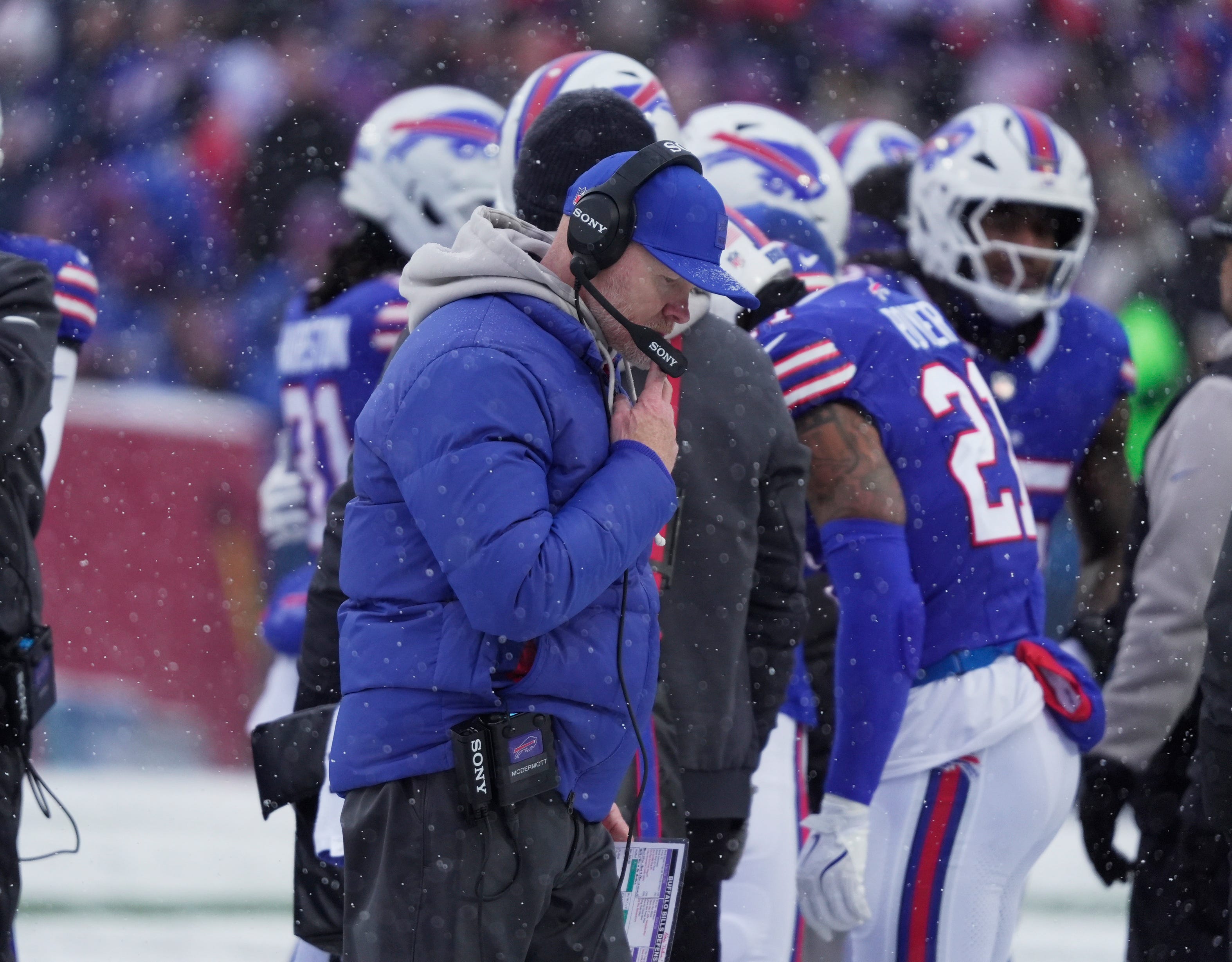 Buffalo Bills head coach Sean McDermott talks to a coach over the headset during first half action at Highmark Stadium in Orchard Park on Dec. 7, 2025.