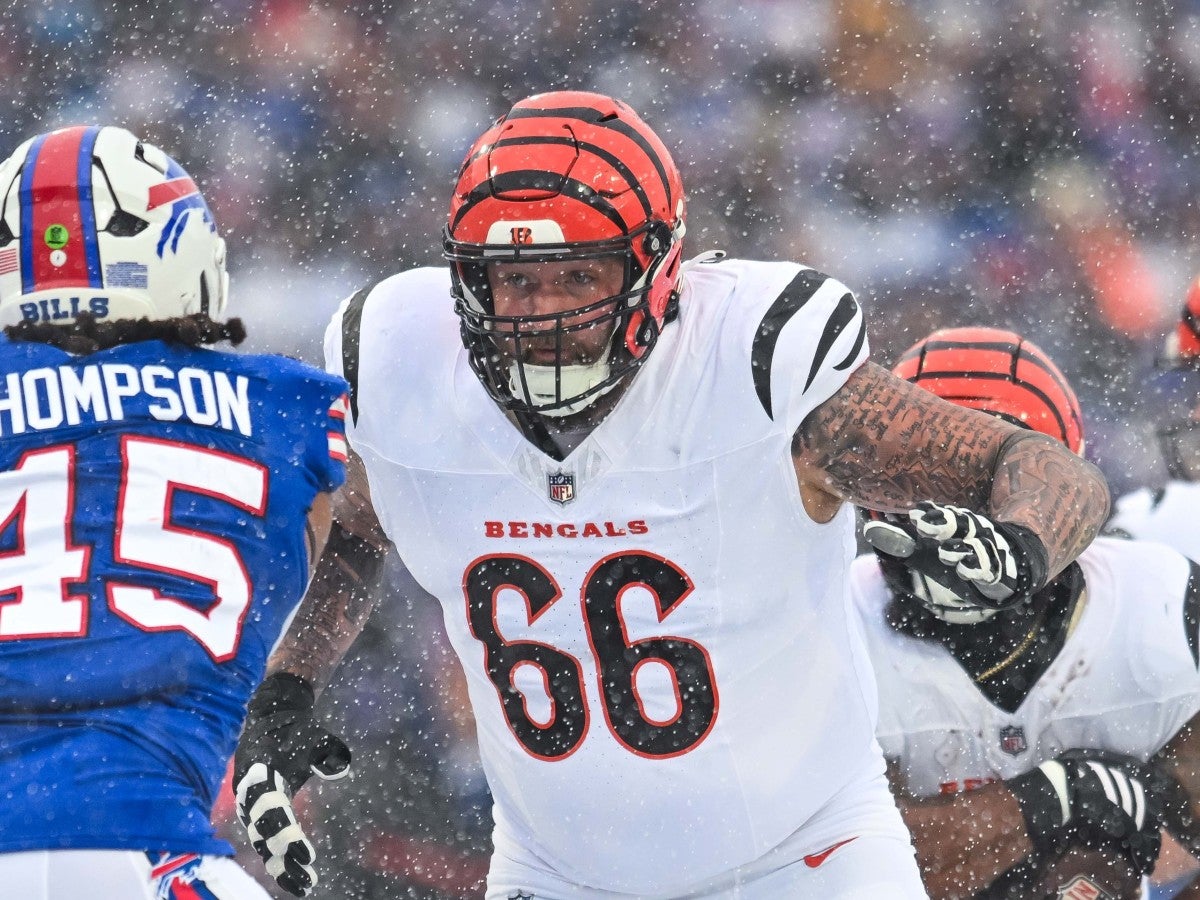 Dec 7, 2025; Orchard Park, New York, USA; Cincinnati Bengals guard Dalton Risner (66) looks to block Buffalo Bills linebacker Shaq Thompson (45) in the first quarter at Highmark Stadium.