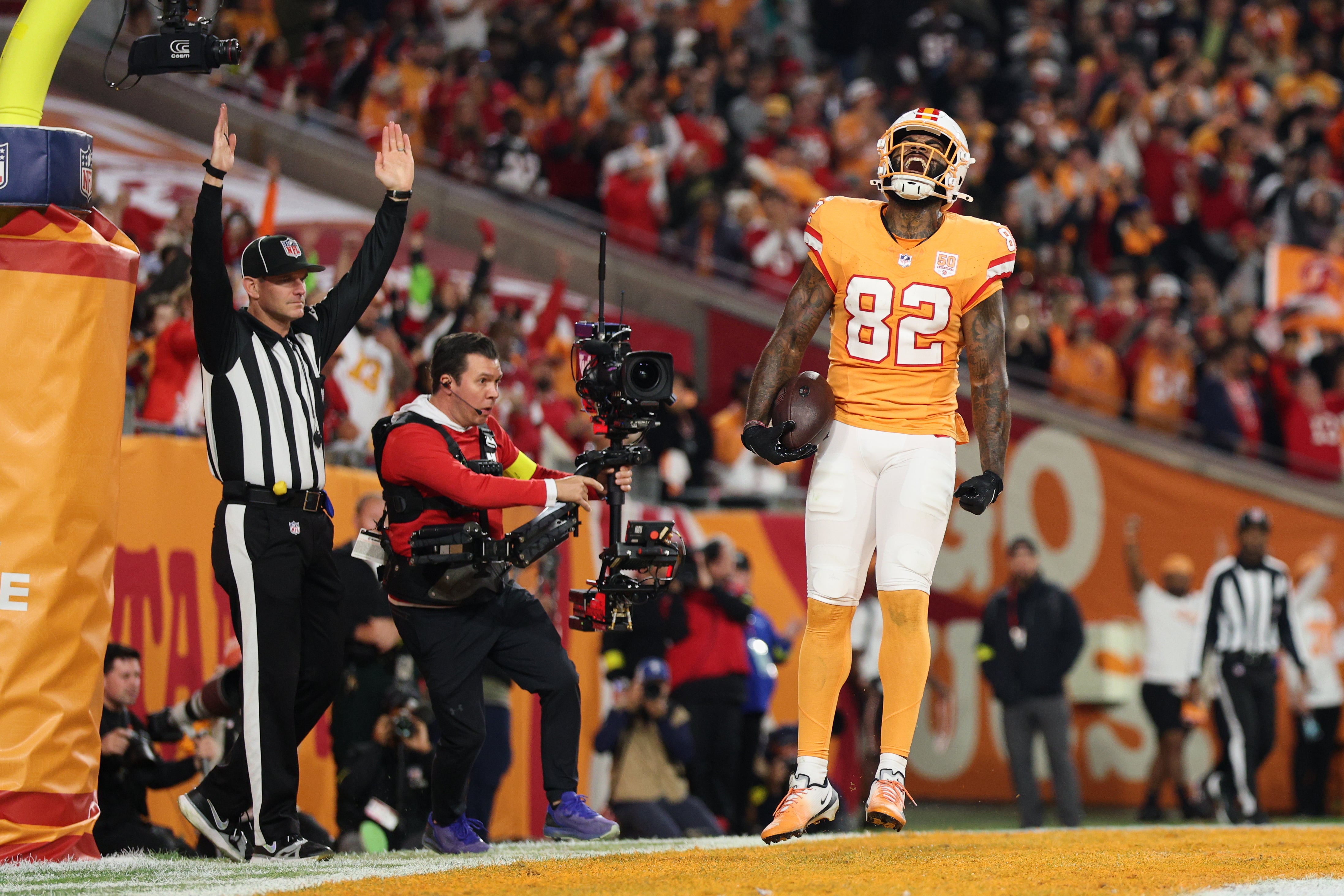 Dec 11, 2025; Tampa, Florida, USA; Tampa Bay Buccaneers tight end Devin Culp (82) reacts after catching a six-yard touchdown pass thrown by quarterback Baker Mayfield (not pictured) against the Atlanta Falcons during the third quarter at Raymond James Stadium.