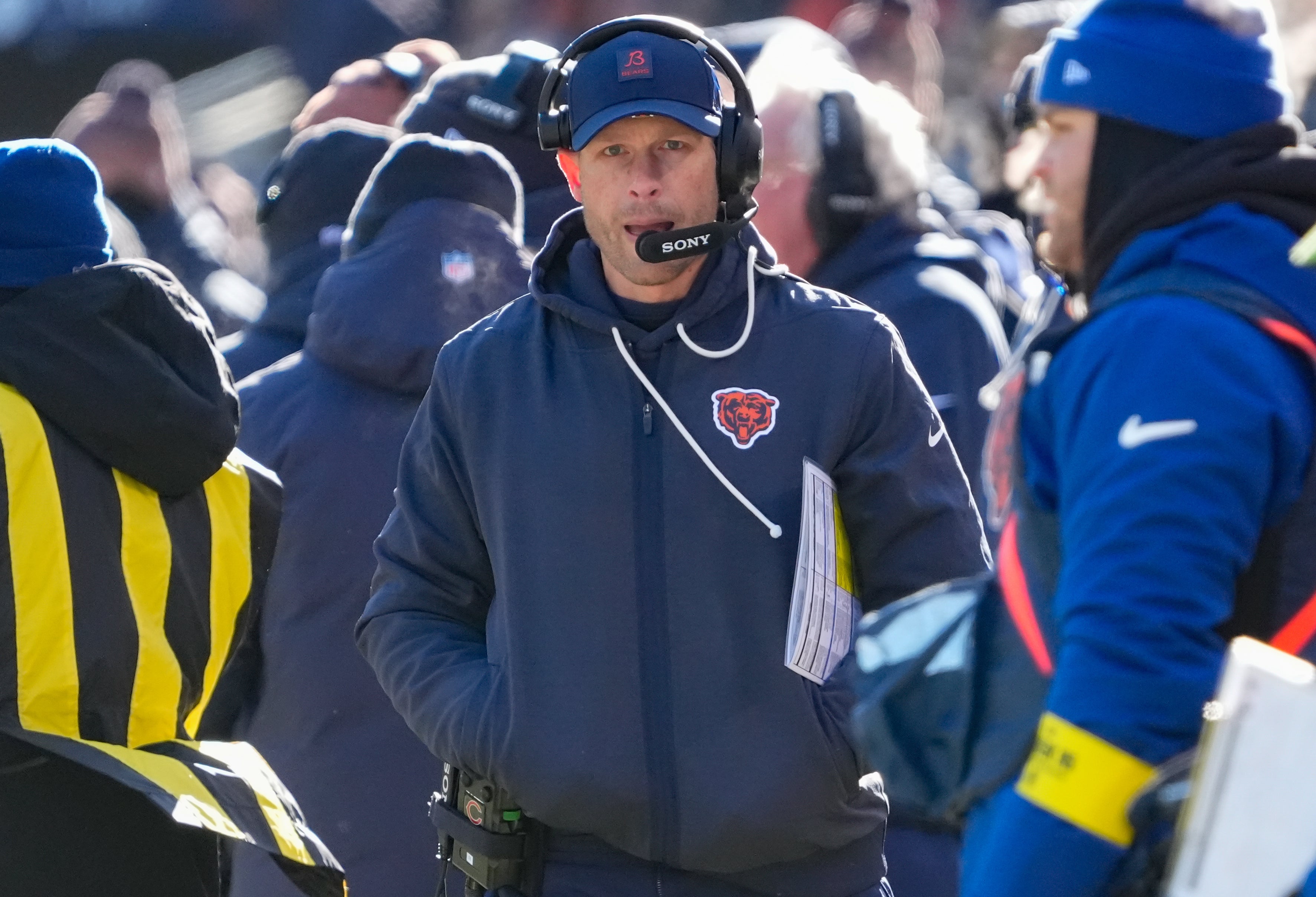 Dec 14, 2025; Chicago, Illinois, USA; Chicago Bears head coach Ben Johnson walks along the sideline during the first quarter against the Cleveland Browns at Soldier Field.