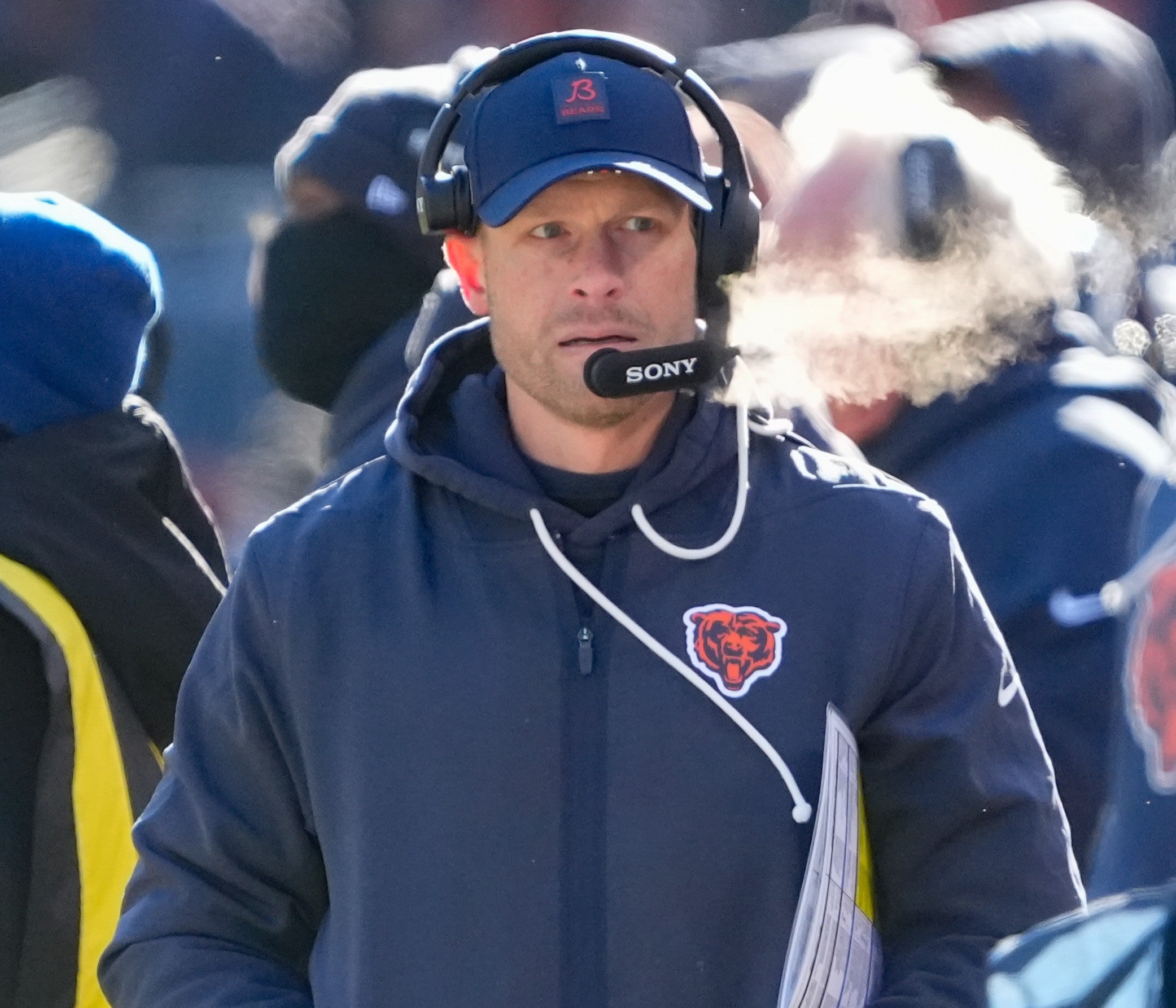 Dec 14, 2025; Chicago, Illinois, USA; Chicago Bears head coach Ben Johnson walks along the sideline during the first quarter against the Cleveland Browns at Soldier Field.