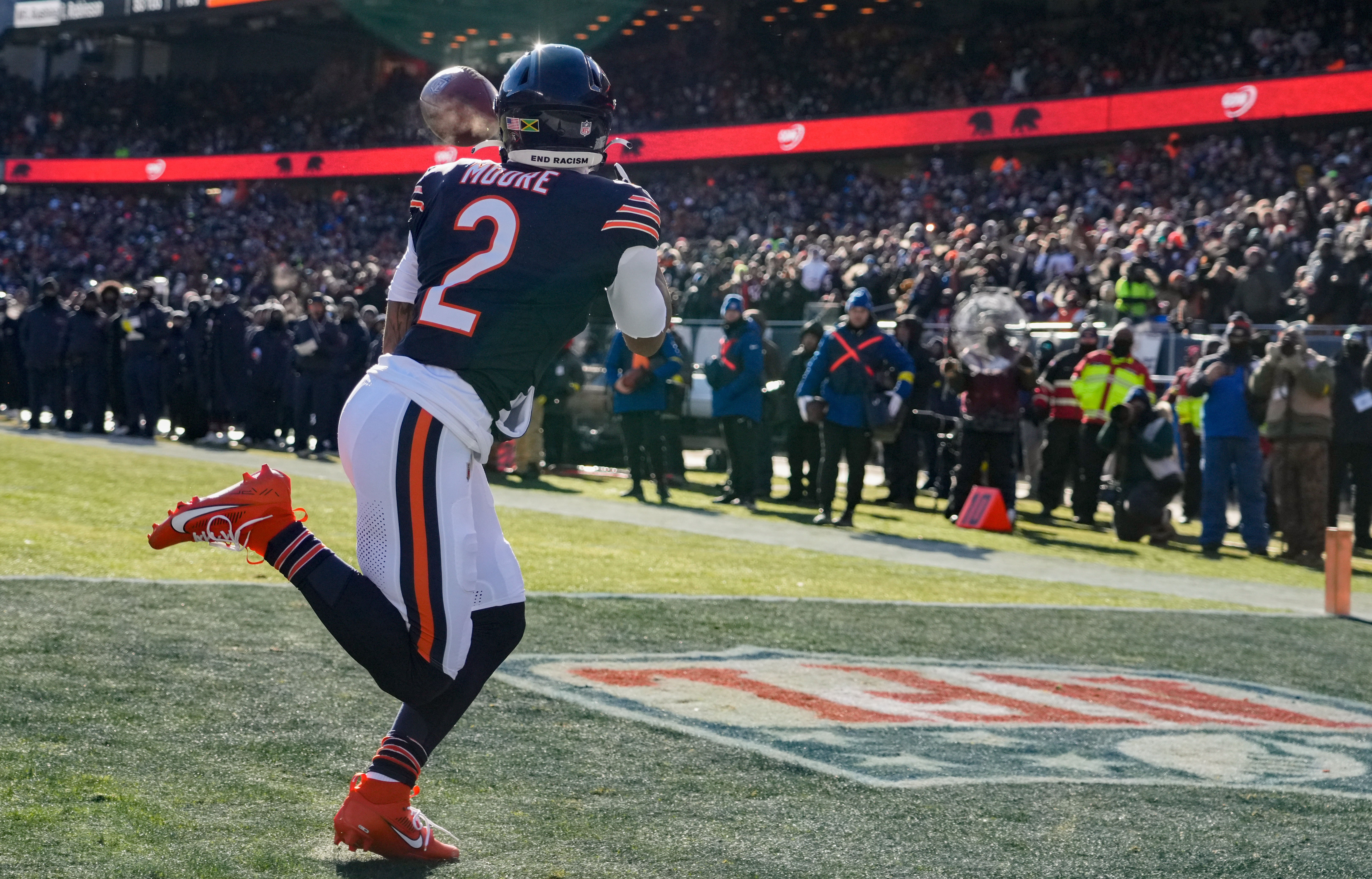 Dec 14, 2025; Chicago, Illinois, USA; Chicago Bears wide receiver DJ Moore (2) catches a pass for a touchdown during the first quarter against the Cleveland Browns at Soldier Field.