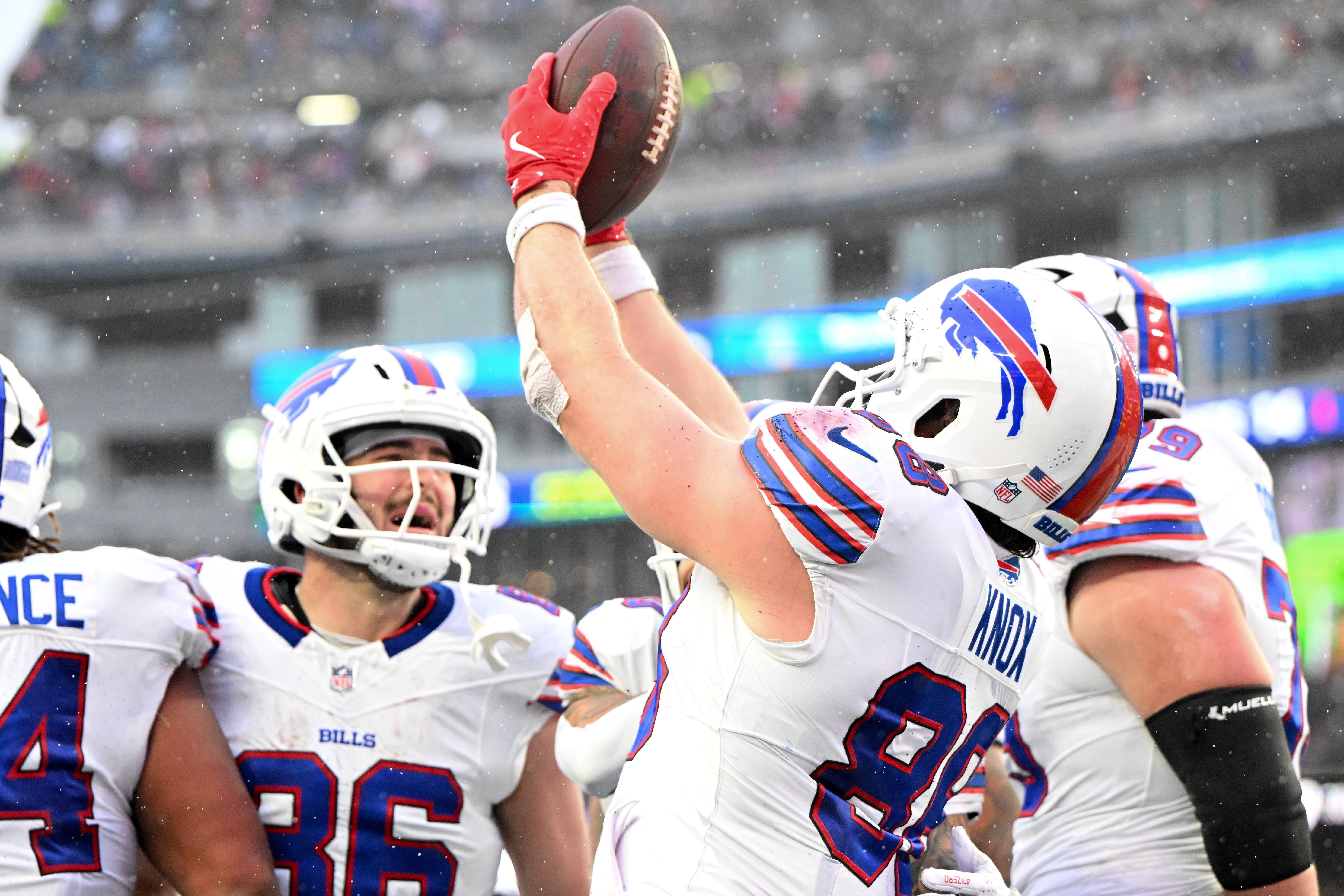 Dec 14, 2025; Foxborough, Massachusetts, USA; Buffalo Bills tight end Dawson Knox (88) reacts after scoring a touchdown against the New England Patriots during the second half at Gillette Stadium.