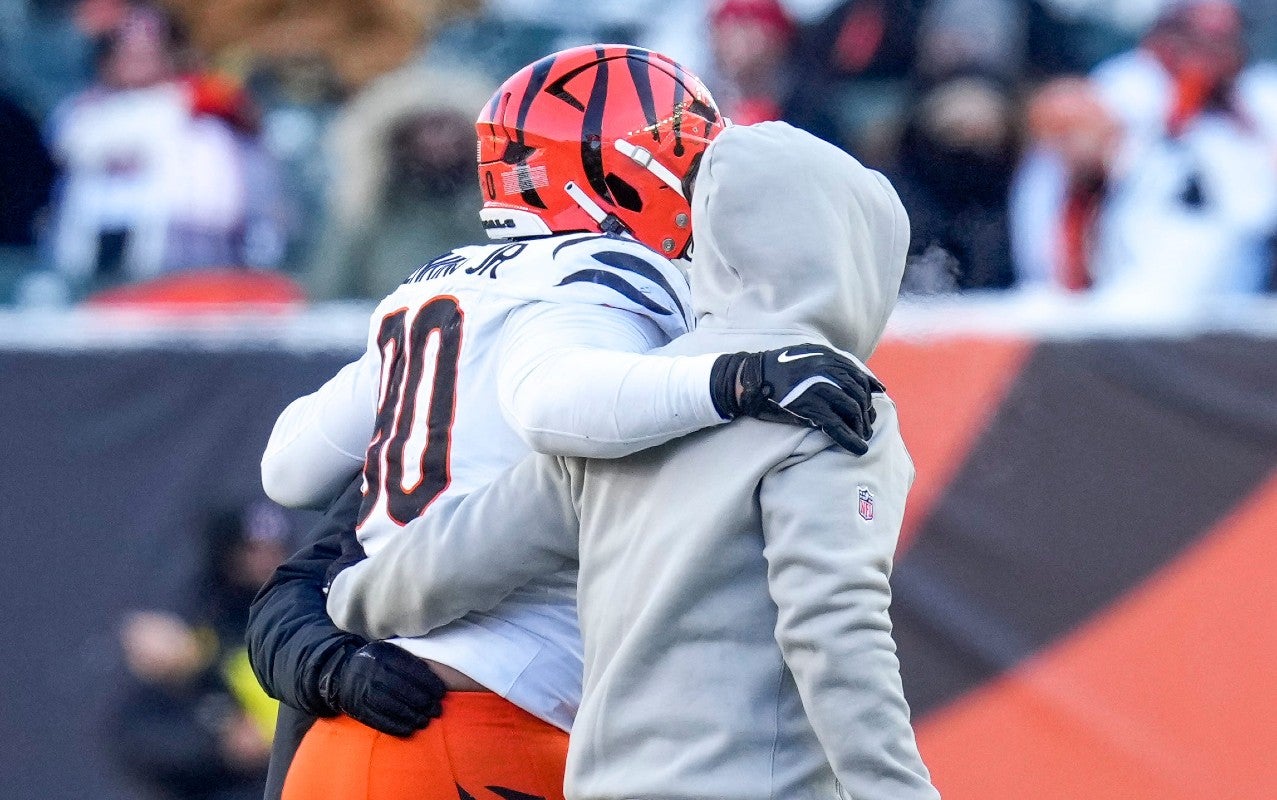 Cincinnati Bengals defensive tackle Kris Jenkins Jr. (90) is assisted off of the field in the third quarter of the NFL Week 15 game between the Cincinnati Bengals and the Baltimore Ravens at Paycor Stadium in Cincinnati on Sunday, Dec. 14, 2025. The Bengals were shut out, 24-0.