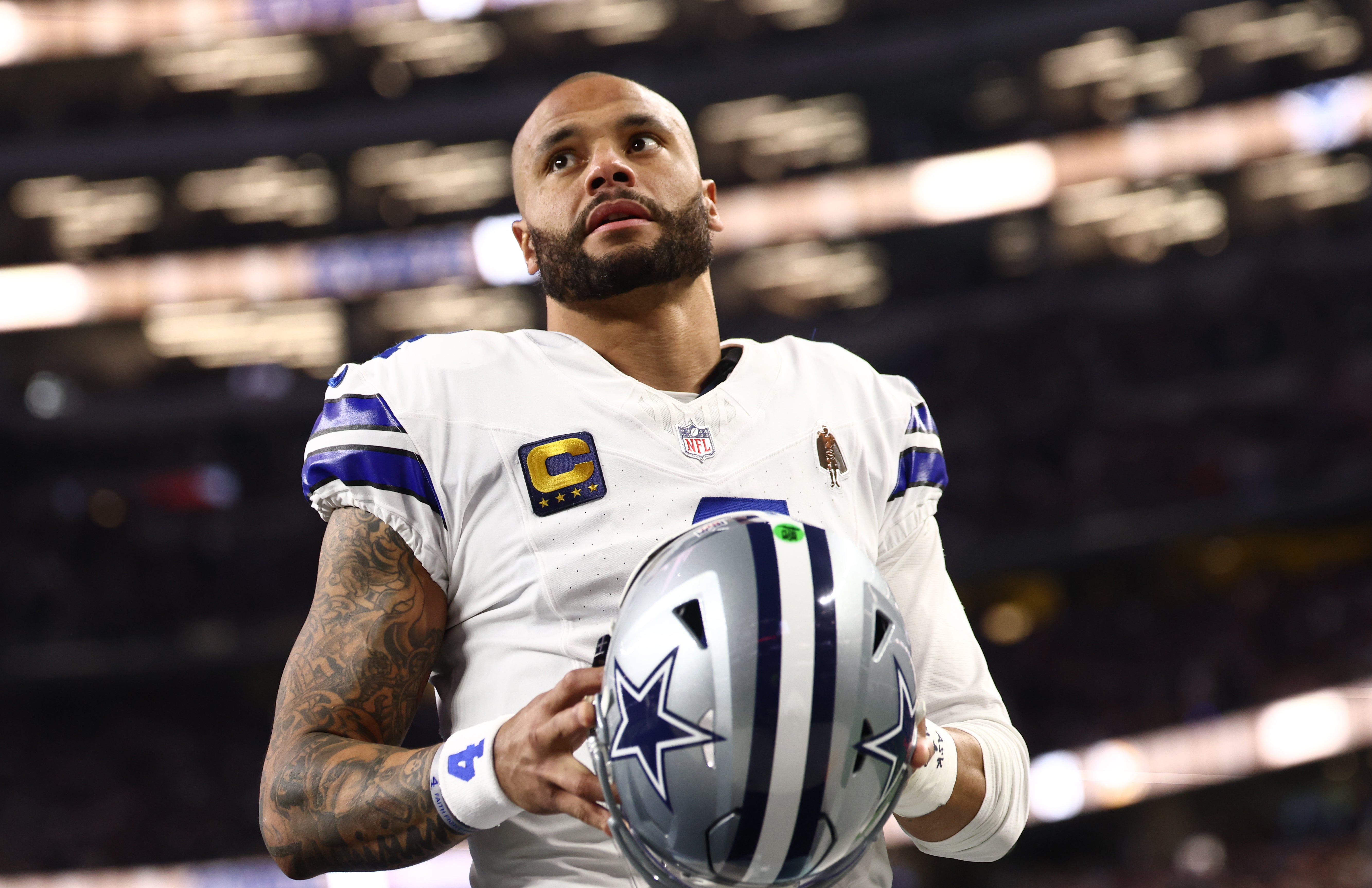 Dec 14, 2025; Arlington, Texas, USA; Dallas Cowboys quarterback Dak Prescott (4) before a game against the Minnesota Vikings at AT&T Stadium.