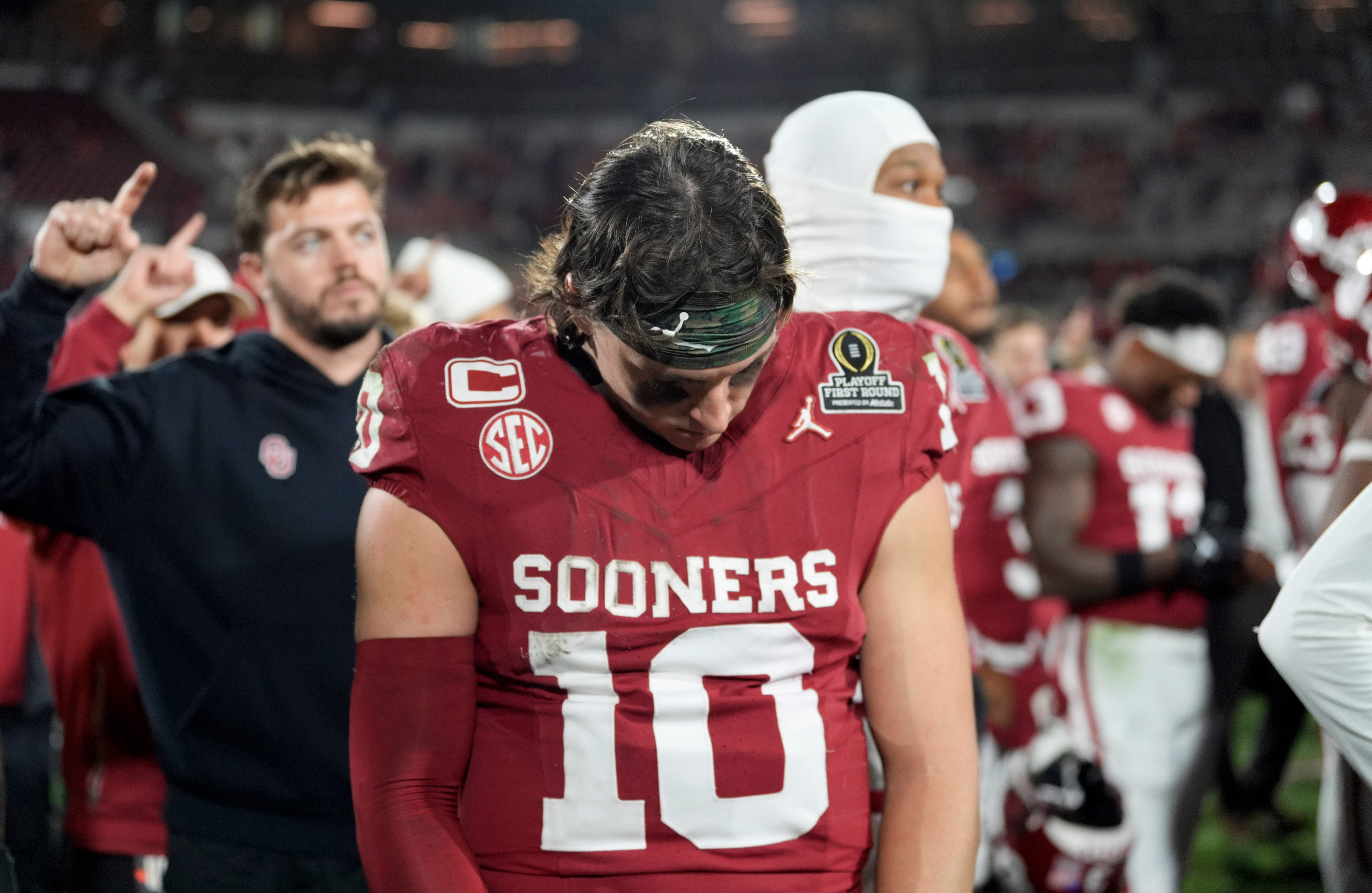 Oklahoma's John Mateer (10) reacts following the College Football Playoff game between the University of Oklahoma Sooners (OU) and the Alabama Crimson Tide at the Gaylord Family Ð Oklahoma Memorial Stadium in Norman, Okla., Friday Dec. 19, 2025.