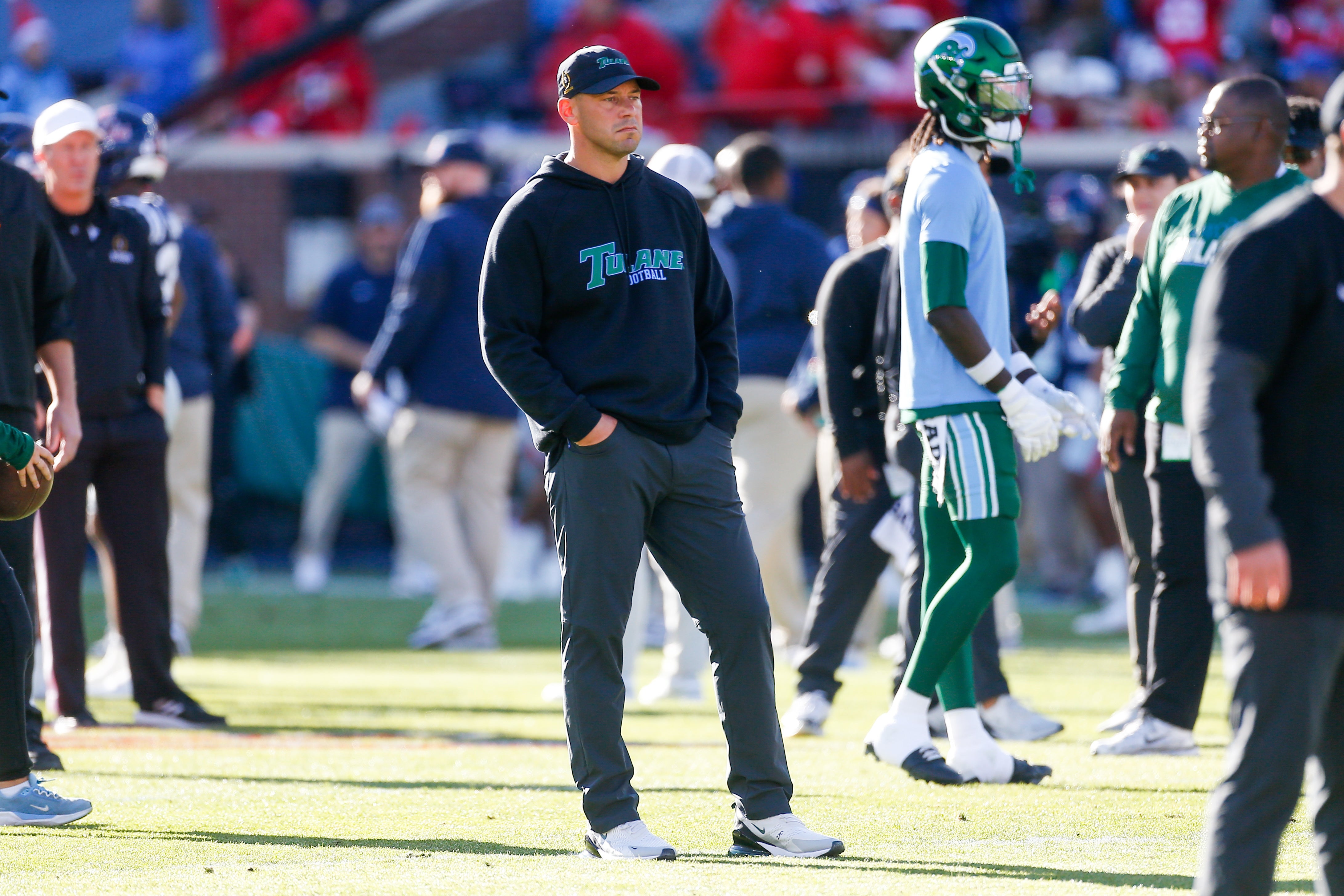 Dec 20, 2025; Oxford, MS, USA; Tulane Green Wave head coach Jon Sumrall on the field prior to a game Mississippi Rebels at Vaught-Hemingway Stadium.