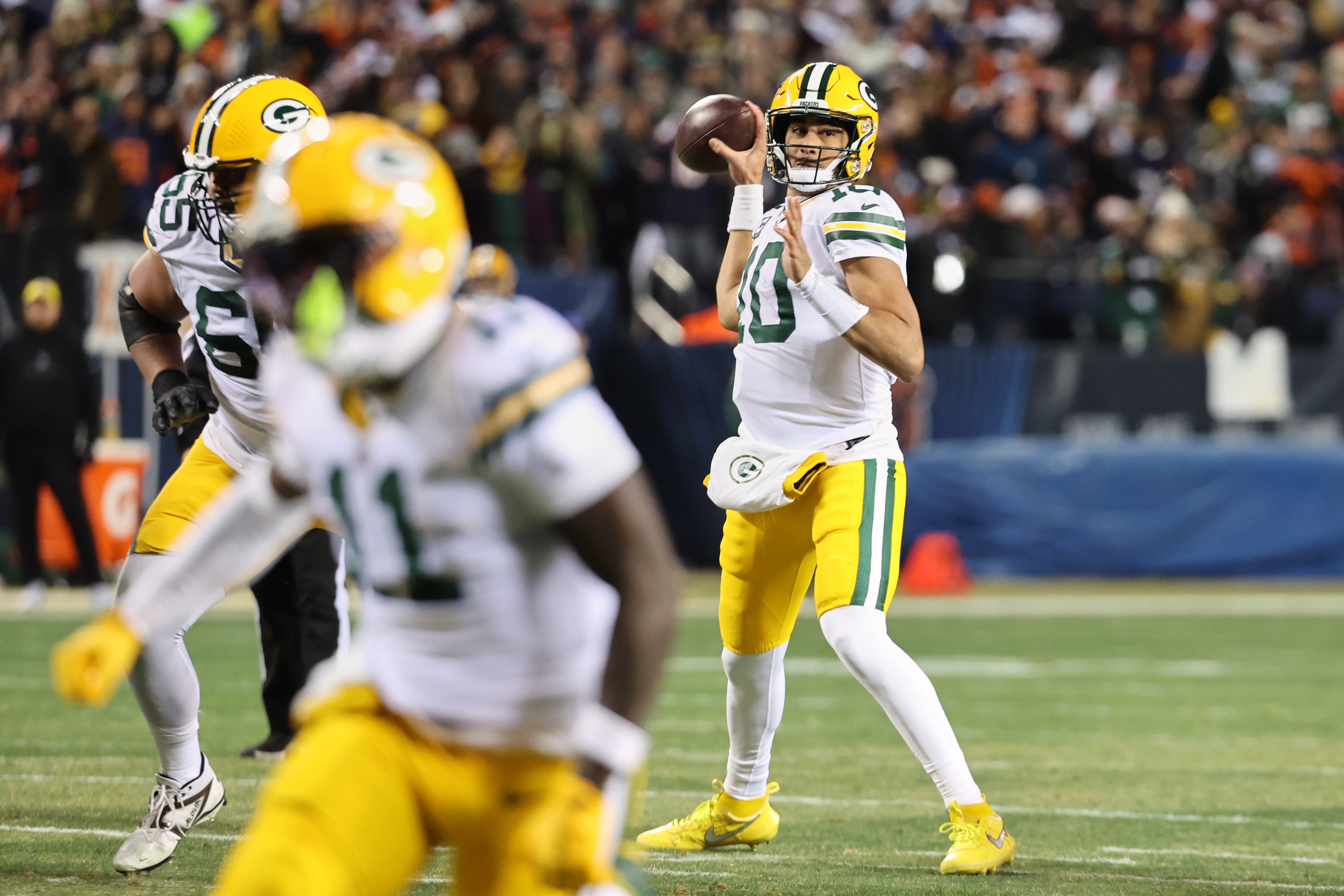 Dec 20, 2025; Chicago, Illinois, USA; Green Bay Packers quarterback Jordan Love (10) throws a pass against the Chicago Bears during the first quarter at Soldier Field.
