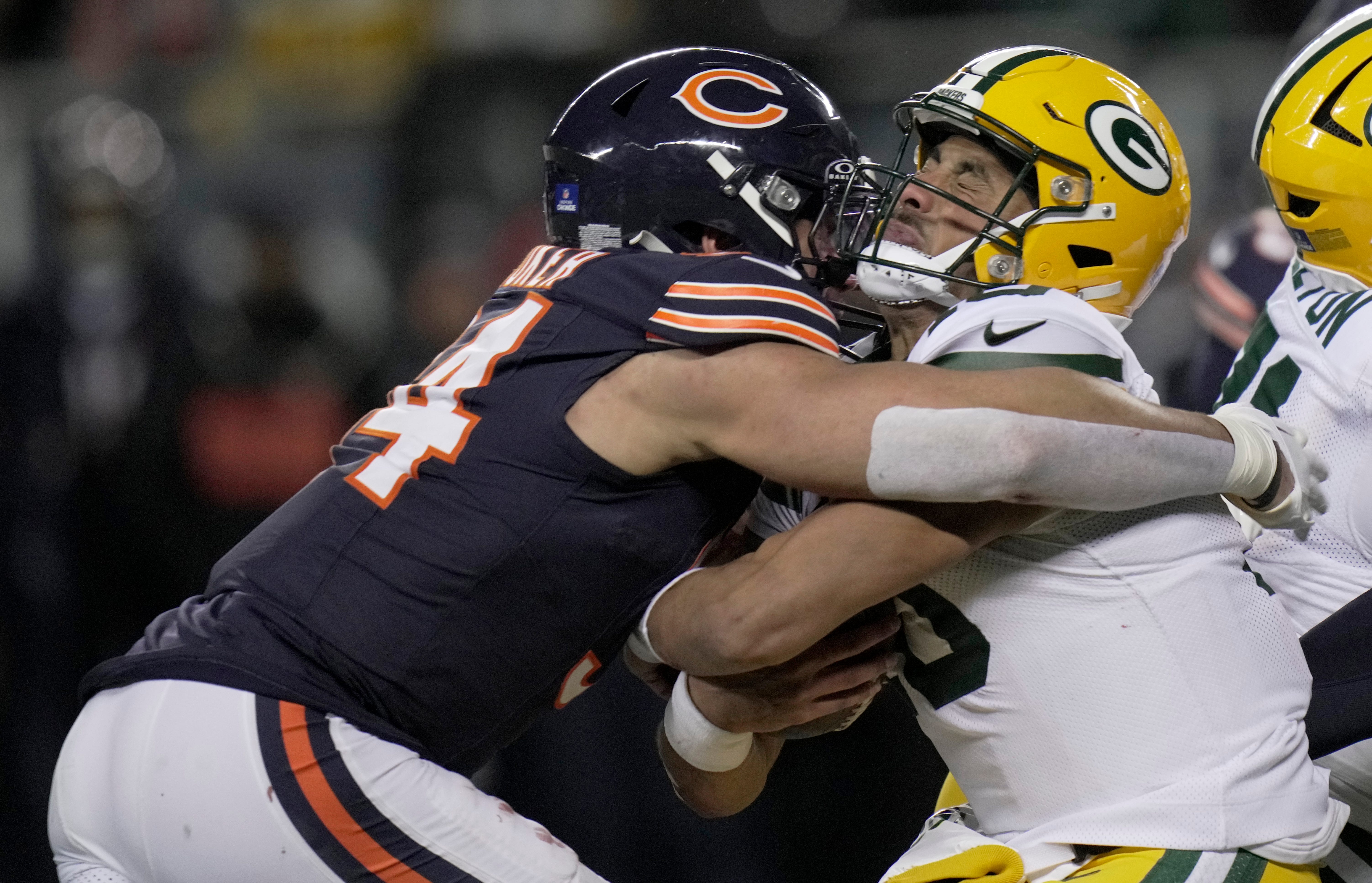 Green Bay Packers quarterback Jordan Love (10) is sacked by Chicago Bears defensive end Austin Booker (94) and suffers a concussion during the second quarter of their game Saturday, December 20, 2025 at Soldier Field in Chicago, Illinois.