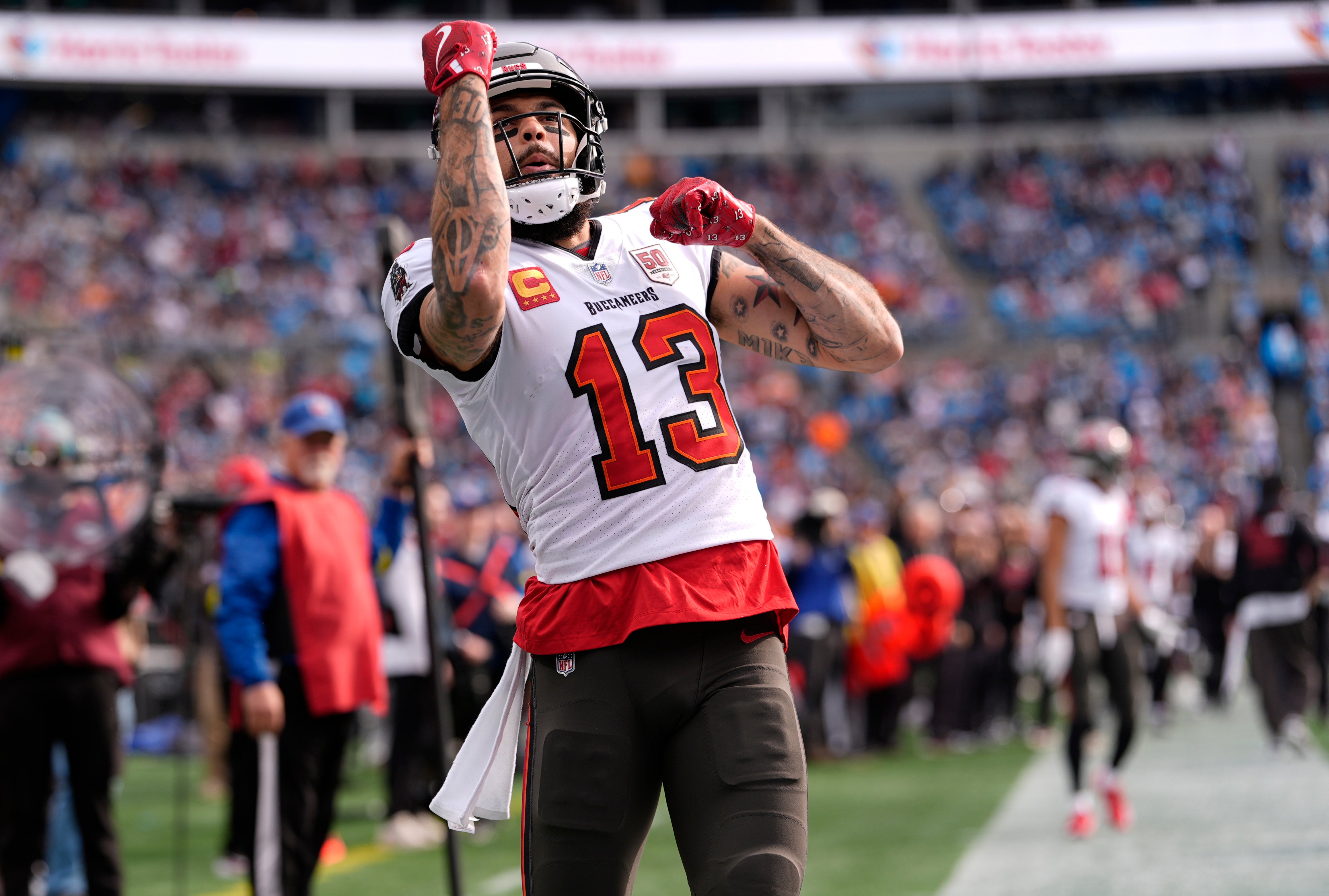 Dec 21, 2025; Charlotte, North Carolina, USA; Tampa Bay Buccaneers wide receiver Mike Evans (13) reacts a touchdown during the first half against the Carolina Panthers at Bank of America Stadium.