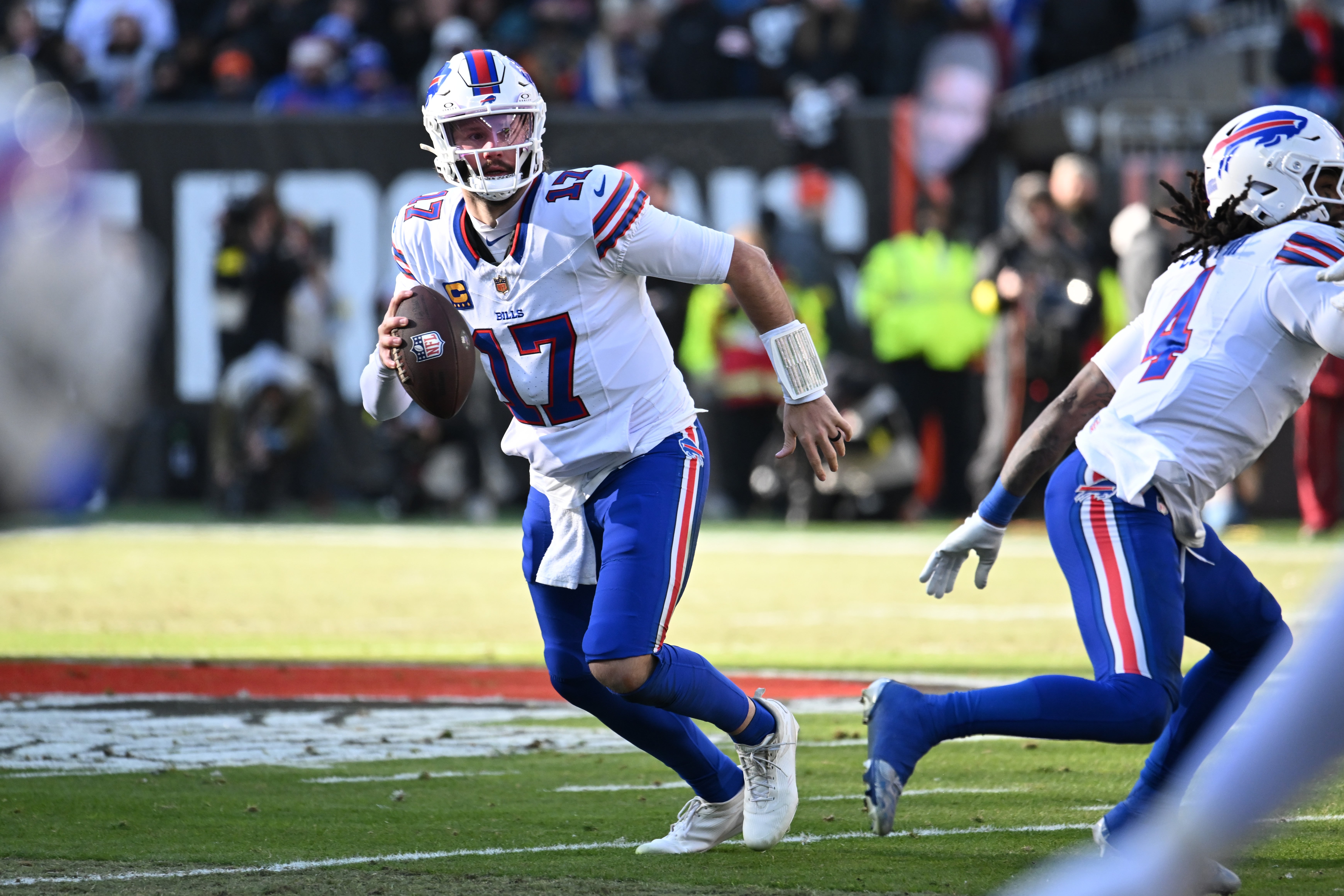 Dec 21, 2025; Cleveland, Ohio, USA; Buffalo Bills quarterback Josh Allen (17) looks downfield against the Cleveland Browns during the first half at Huntington Bank Field.