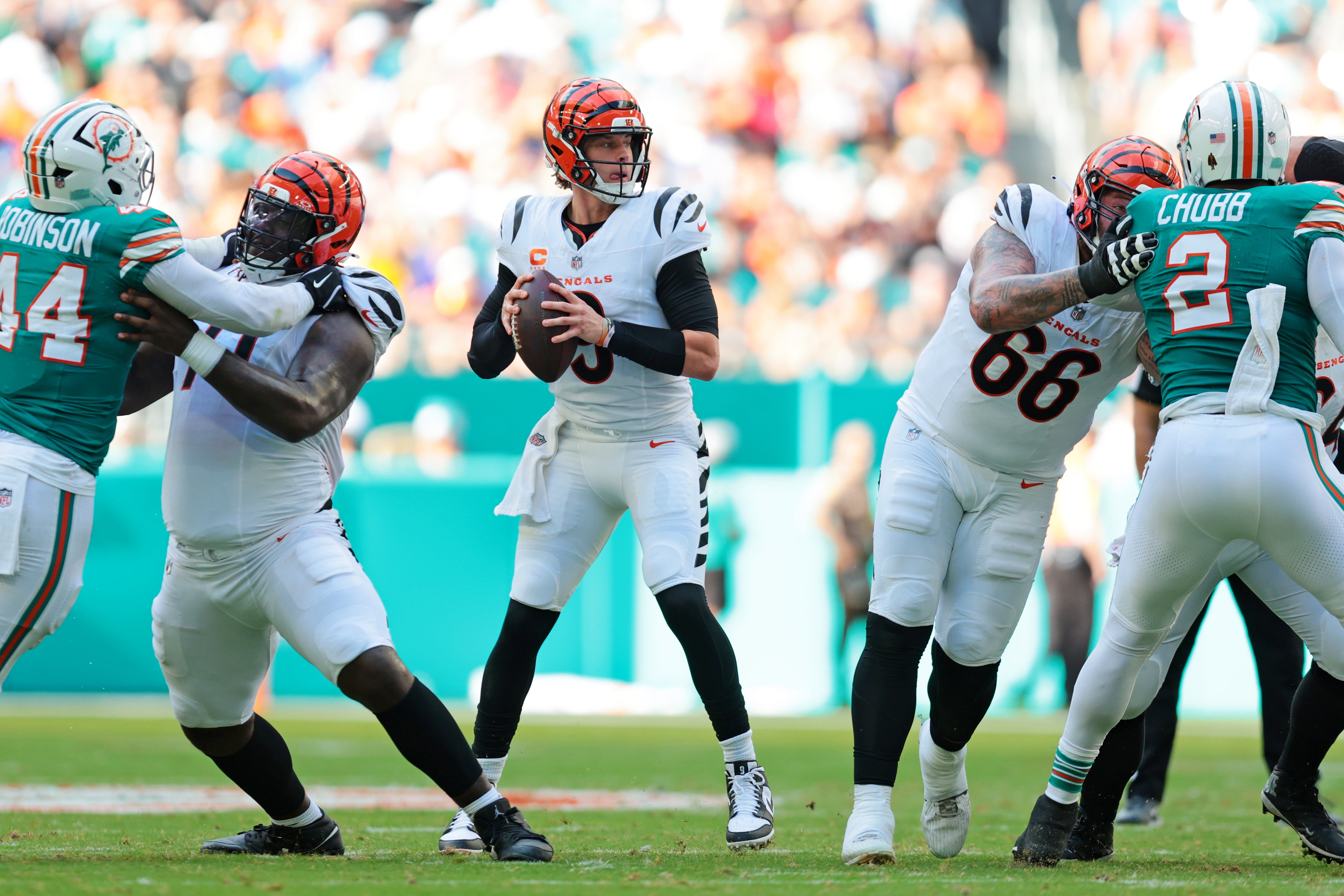 Dec 21, 2025; Miami Gardens, Florida, USA; Cincinnati Bengals quarterback Joe Burrow (9) drops back for a pass during the second quarter against the Miami Dolphins at Hard Rock Stadium.