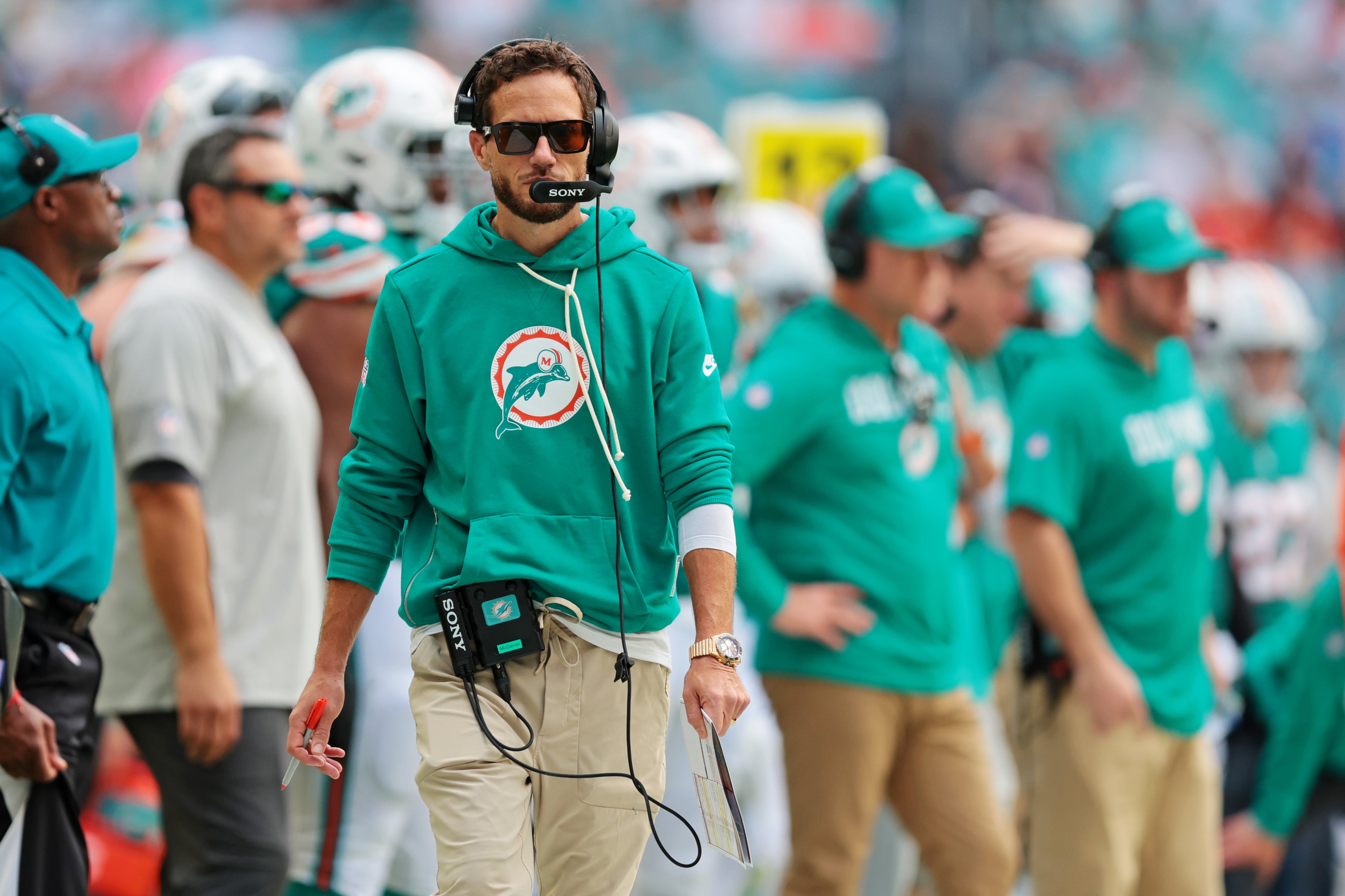 Dec 21, 2025; Miami Gardens, Florida, USA; Miami Dolphins head coach Mike McDaniel looks on during the second quarter against the Cincinnati Bengals at Hard Rock Stadium.
