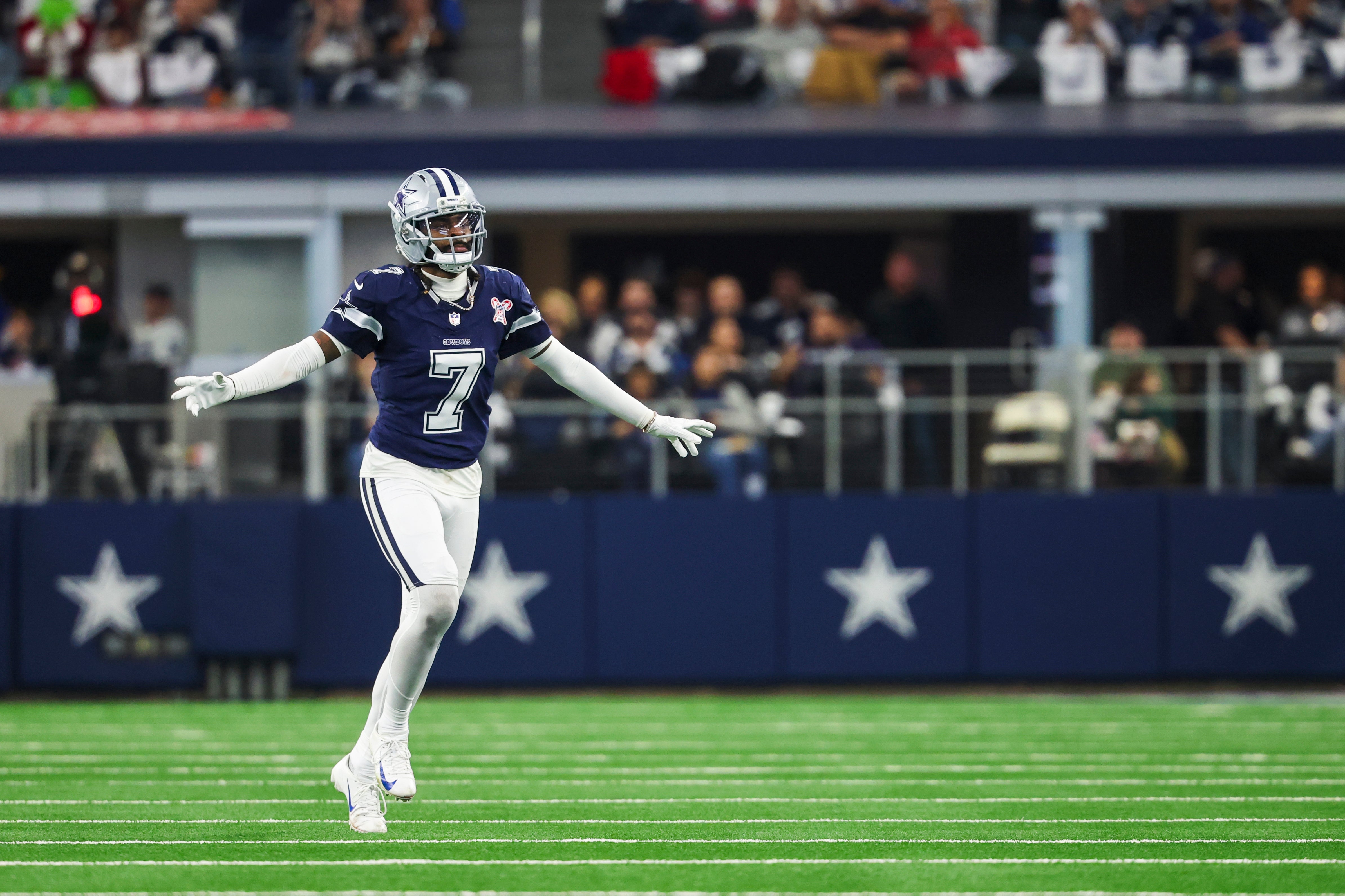 Dec 21, 2025; Arlington, Texas, USA; Dallas Cowboys cornerback Trevon Diggs (7) reacts following a play against the Los Angeles Chargers during the third quarter at AT&T Stadium.