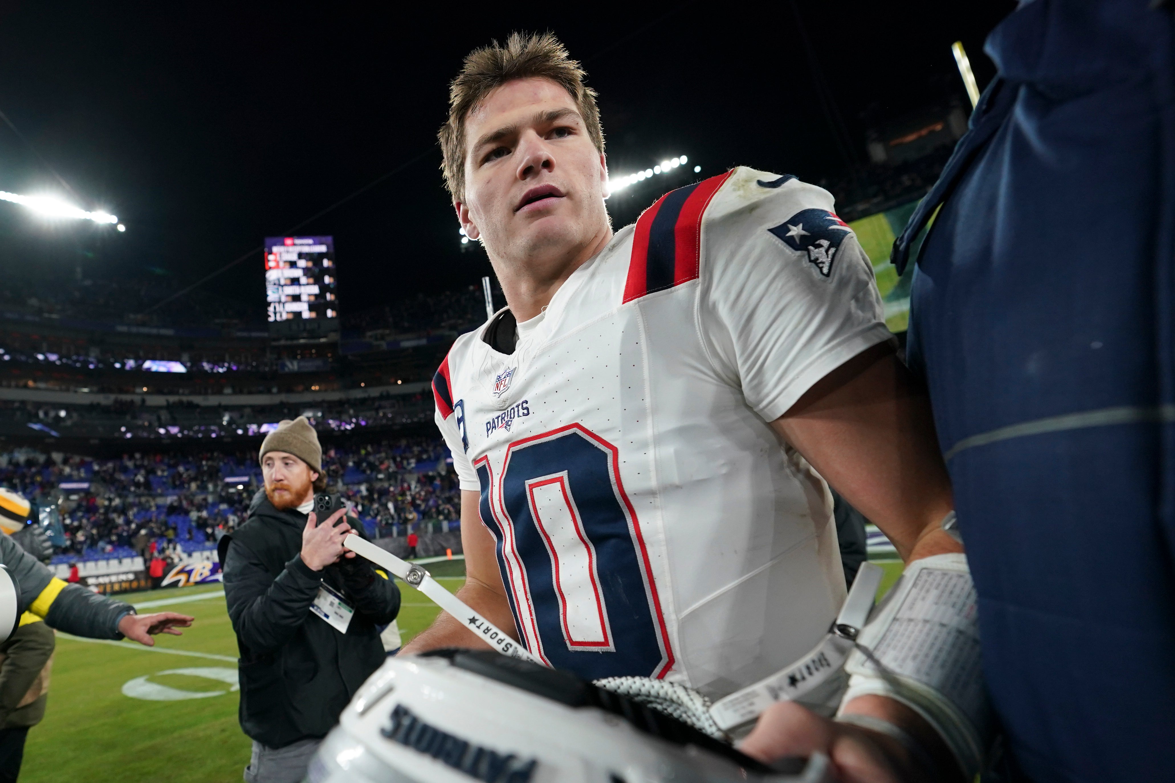 Dec 21, 2025; Baltimore, Maryland, USA; New England Patriots quarterback Drake Maye (10) walks off the field after defeating the Baltimore Ravens at M&T Bank Stadium.