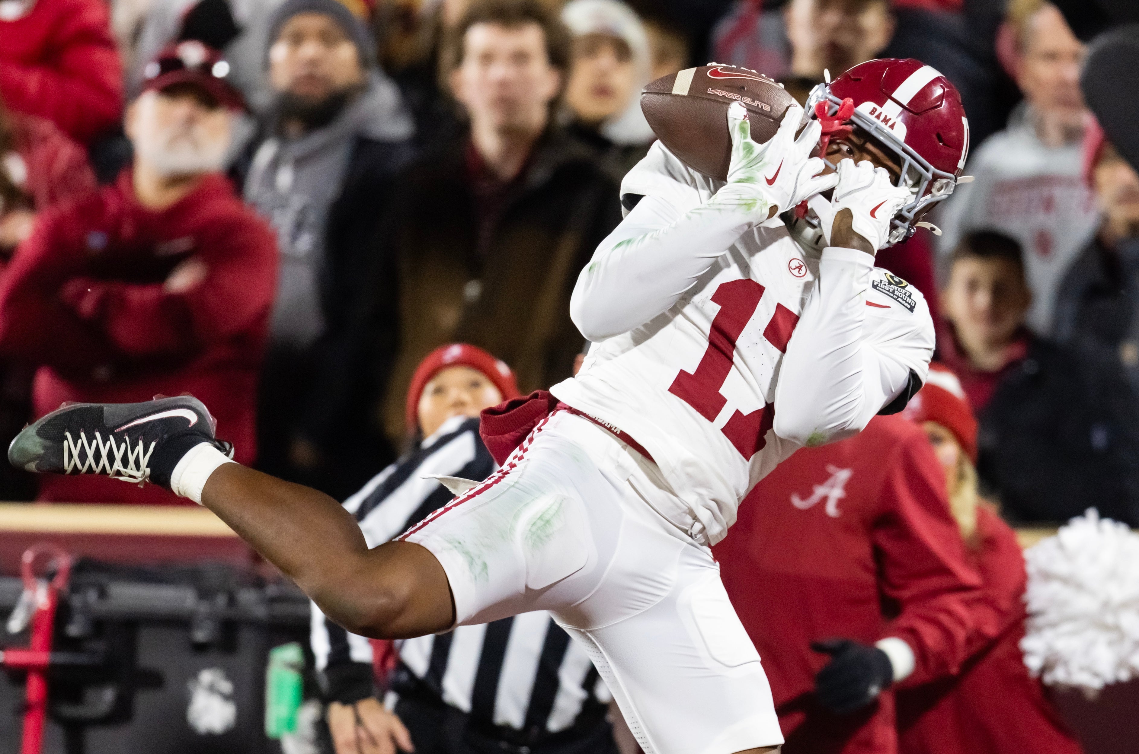 Dec 19, 2025; Norman, OK, USA; Alabama Crimson Tide wide receiver Lotzeir Brooks (17) catches a touchdown pass against the Oklahoma Sooners during the CFP National Playoff First Round at Gaylord Family Oklahoma Memorial Stadium.