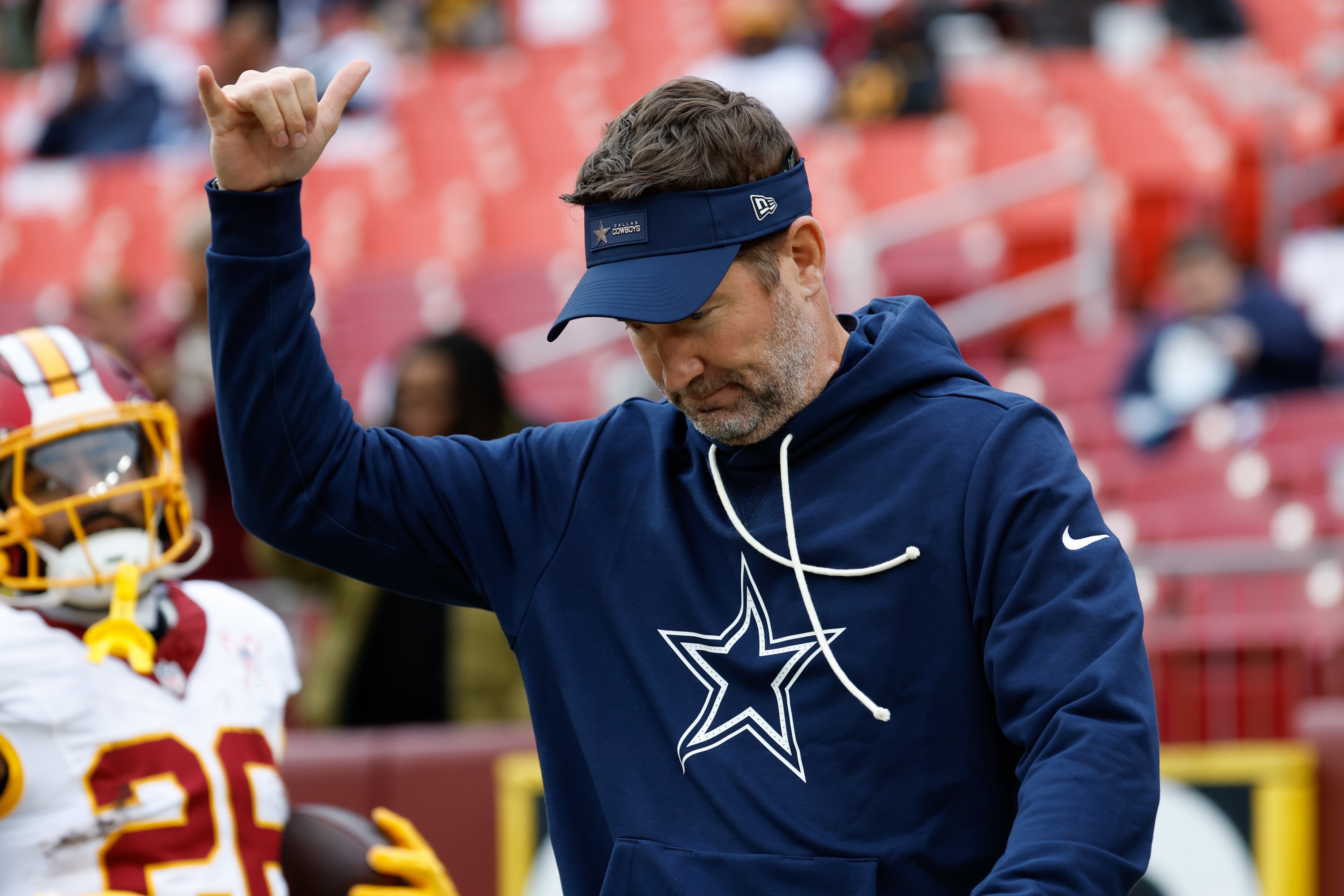 Dec 25, 2025; Landover, Maryland, USA; Dallas Cowboys head coach Brian Schottenheimer looks on during warmups before the game against the Washington Commanders at Northwest Stadium.