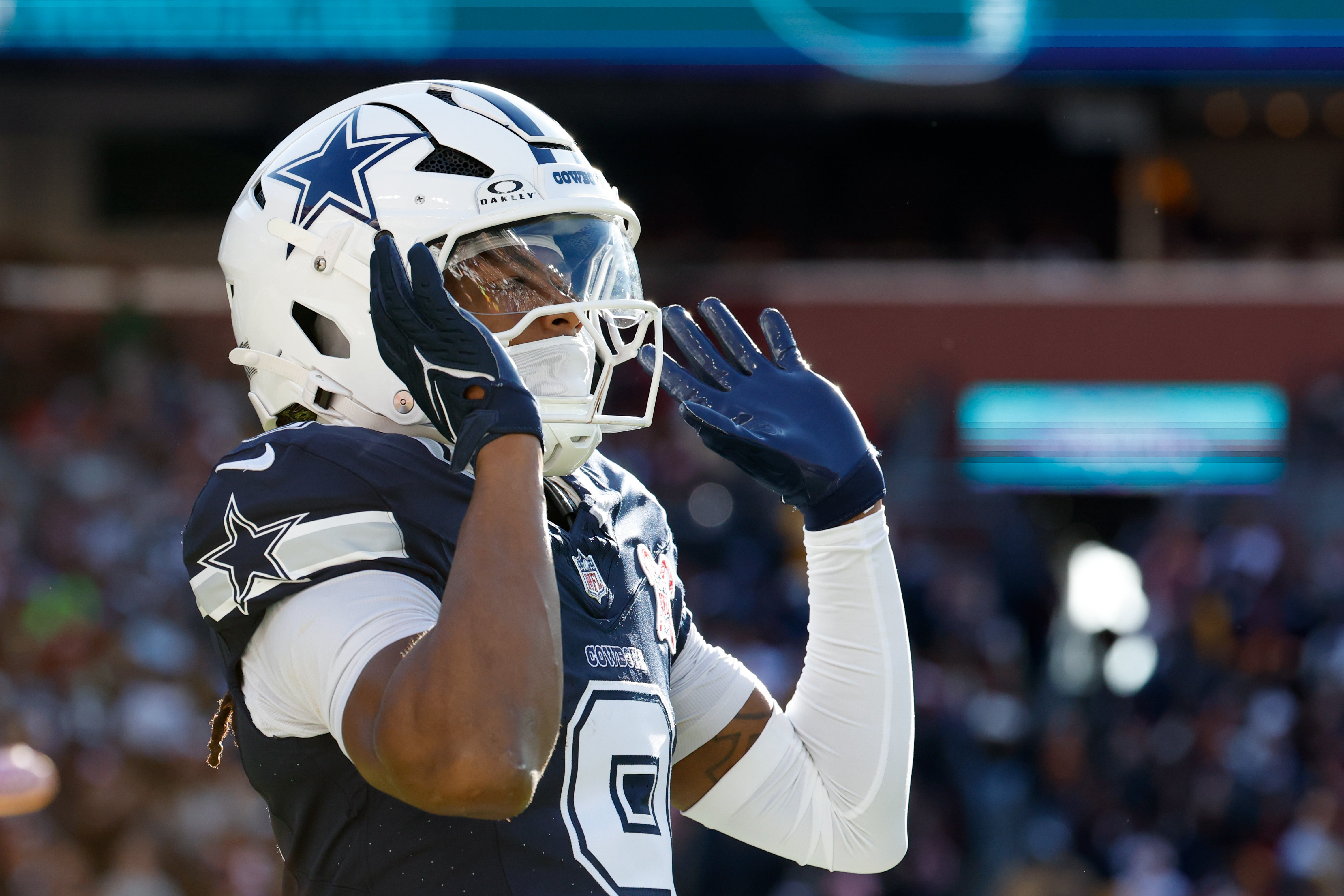 Dec 25, 2025; Landover, Maryland, USA; Dallas Cowboys wide receiver Kavontae Turpin (9) celebrates after scoring a touchdown against the Washington Commanders in the second quarter at Northwest Stadium.
