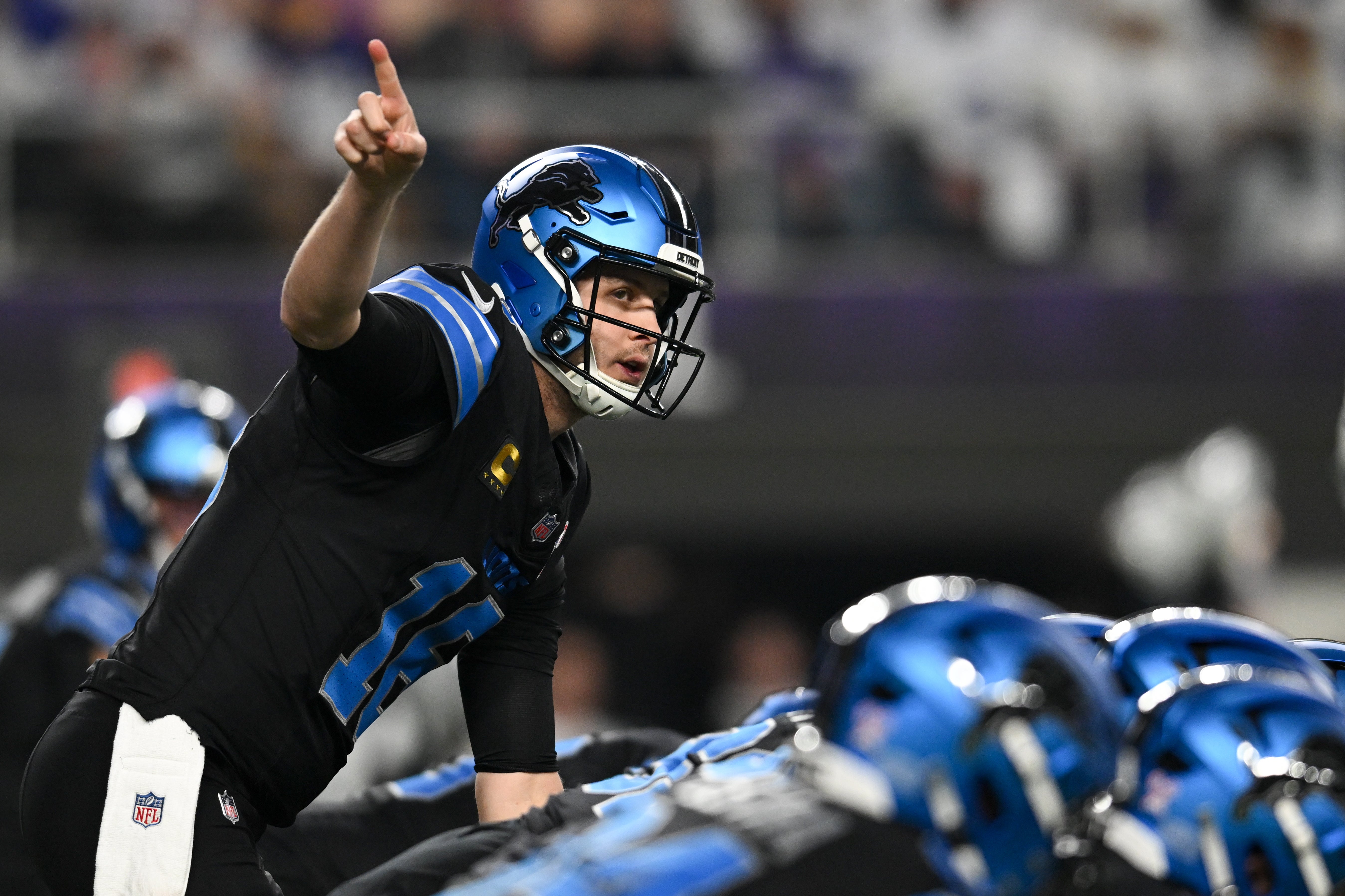 Dec 25, 2025; Minneapolis, Minnesota, USA; Detroit Lions quarterback Jared Goff (16) calls a play at the line of scrimmage against the Minnesota Vikings in the first quarter at U.S. Bank Stadium.