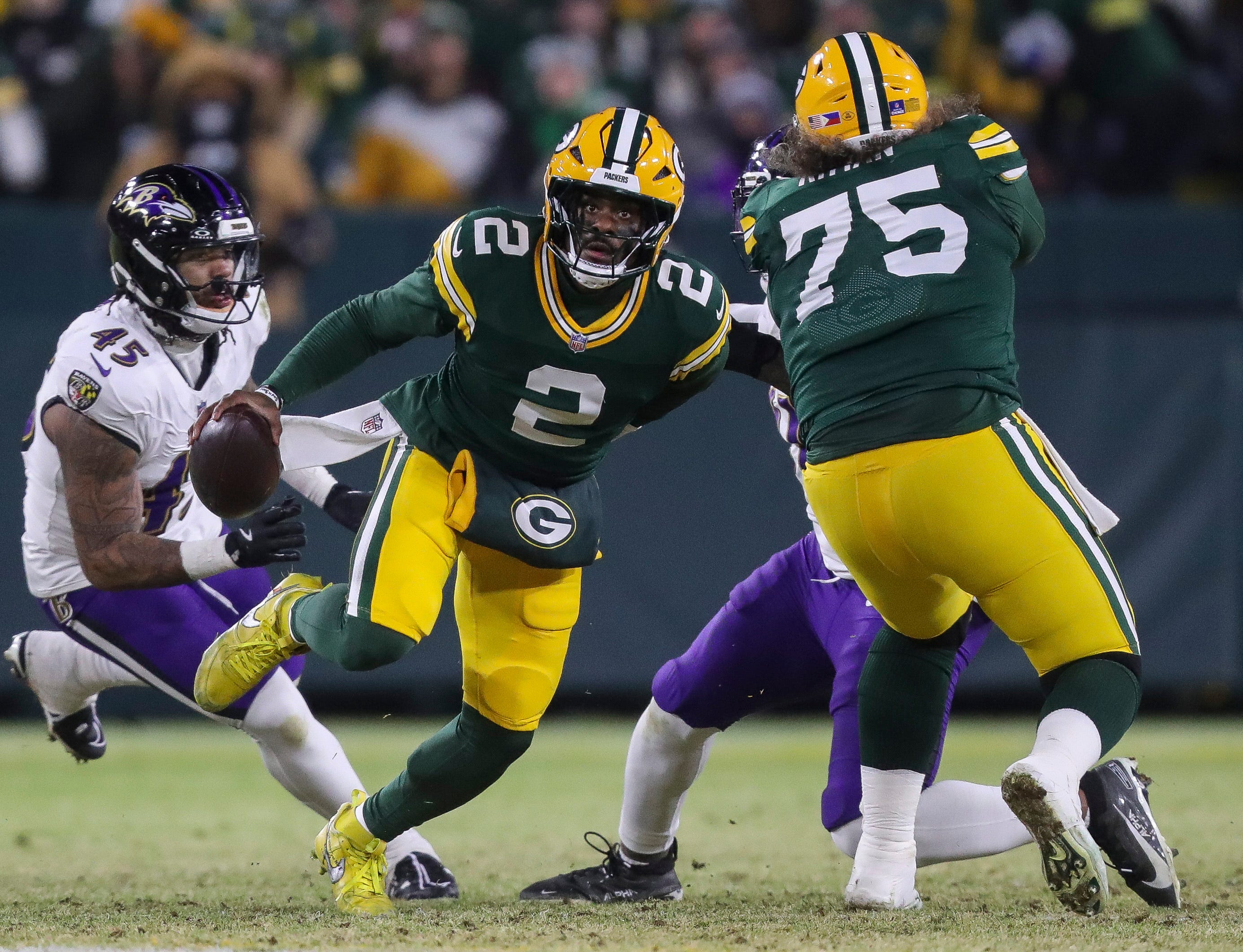 Green Bay Packers quarterback Malik Willis (2) scrambles against the Baltimore Ravens on Saturday, December 27, 2025, at Lambeau Field in Green Bay, Wis. The Ravens won the game, 41-24.