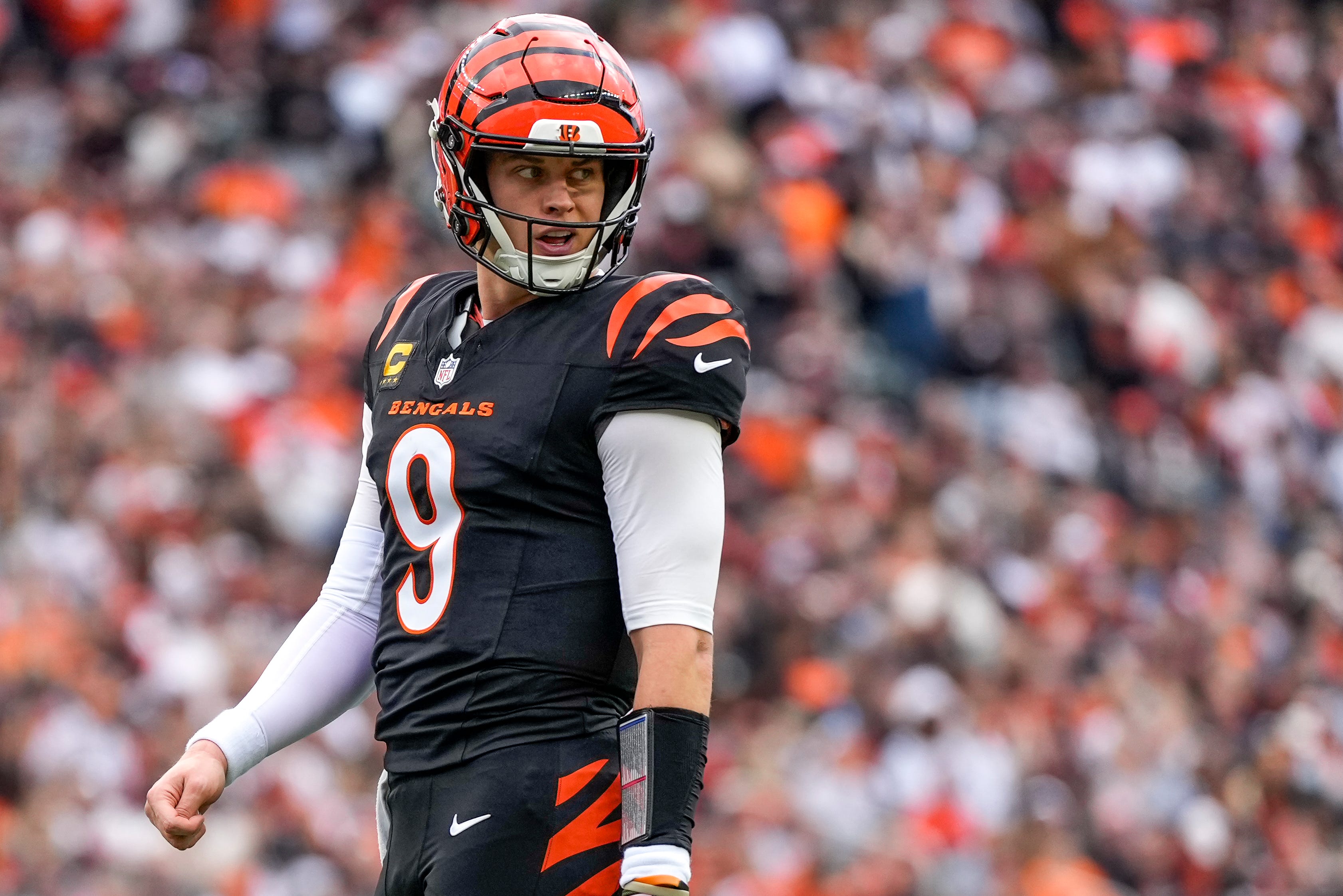 Cincinnati Bengals quarterback Joe Burrow (9) looks back to the sideline before a goal line play in the first quarter of the NFL Week 17 game between the Cincinnati Bengals and the Arizona Cardinals at Paycor Stadium in Downtown Cincinnati on Sunday, Dec. 28, 2025.