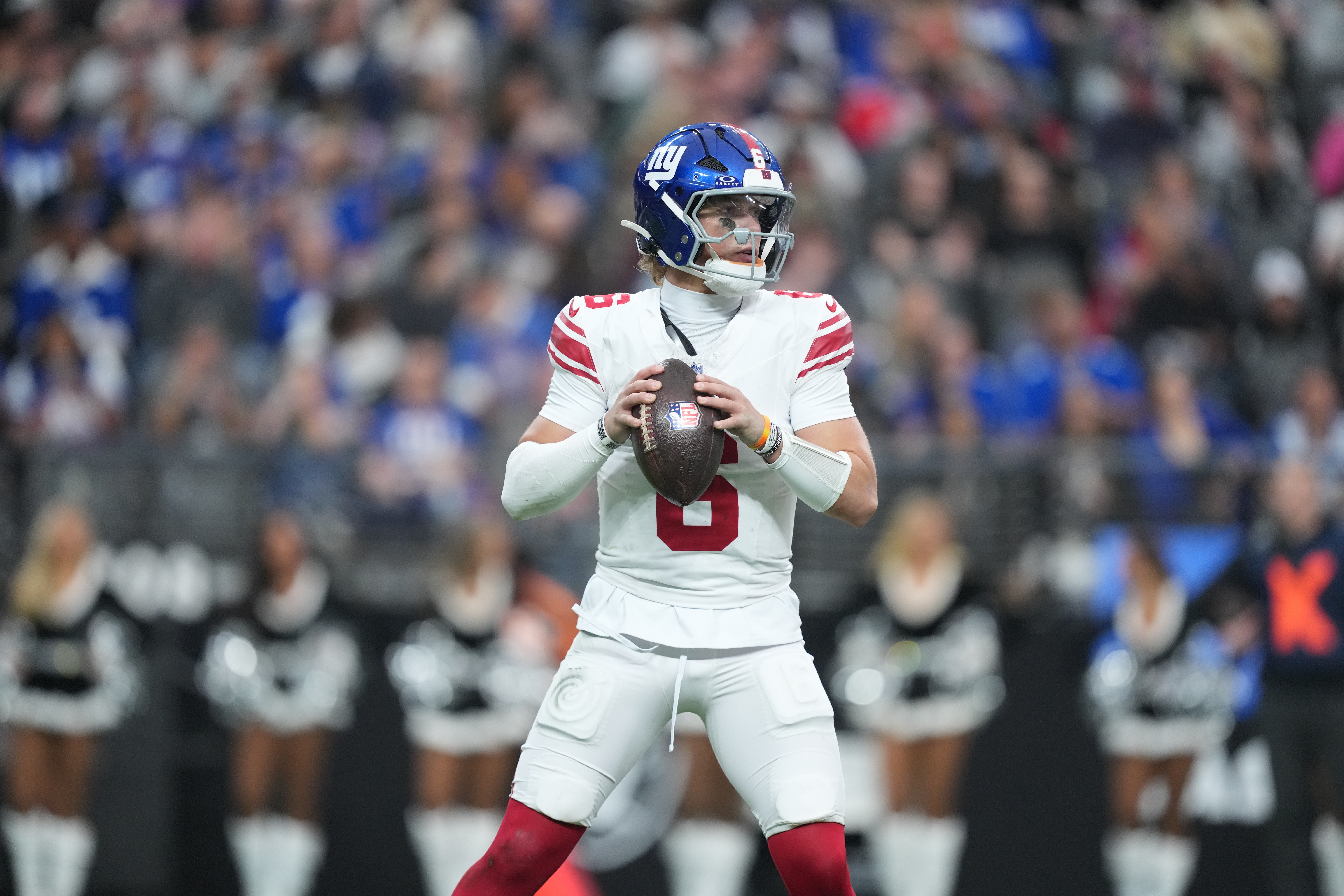 Dec 28, 2025; Paradise, Nevada, USA; New York Giants quarterback Jaxson Dart (6) looks to pass in the second quarter against the Las Vegas Raiders at Allegiant Stadium.
