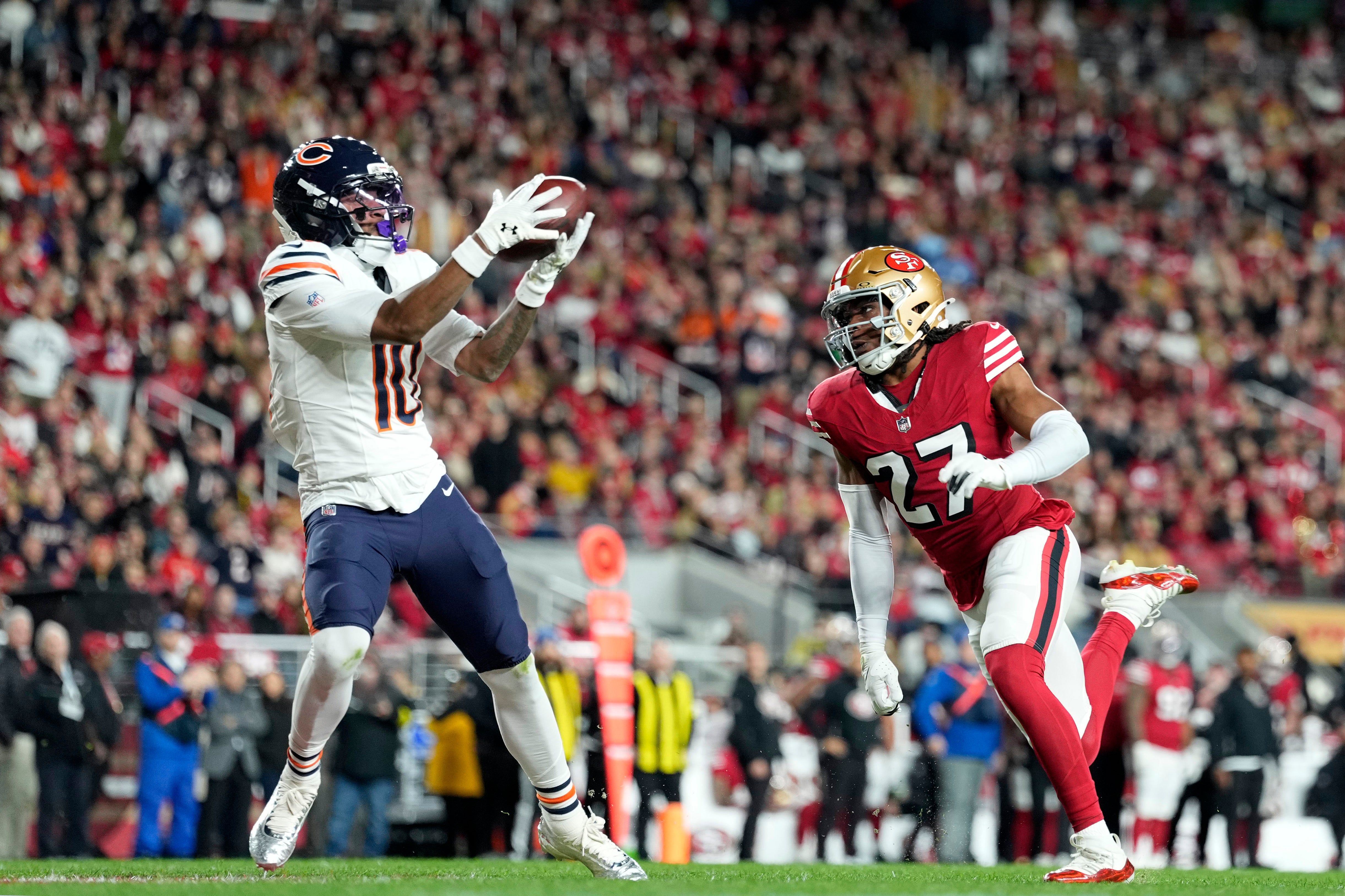 Dec 28, 2025; Santa Clara, California, USA; Chicago Bears wide receiver Luther Burden III (10) makes a catch to score a touchdown against the San Francisco 49ers in the first half at Levi's Stadium.