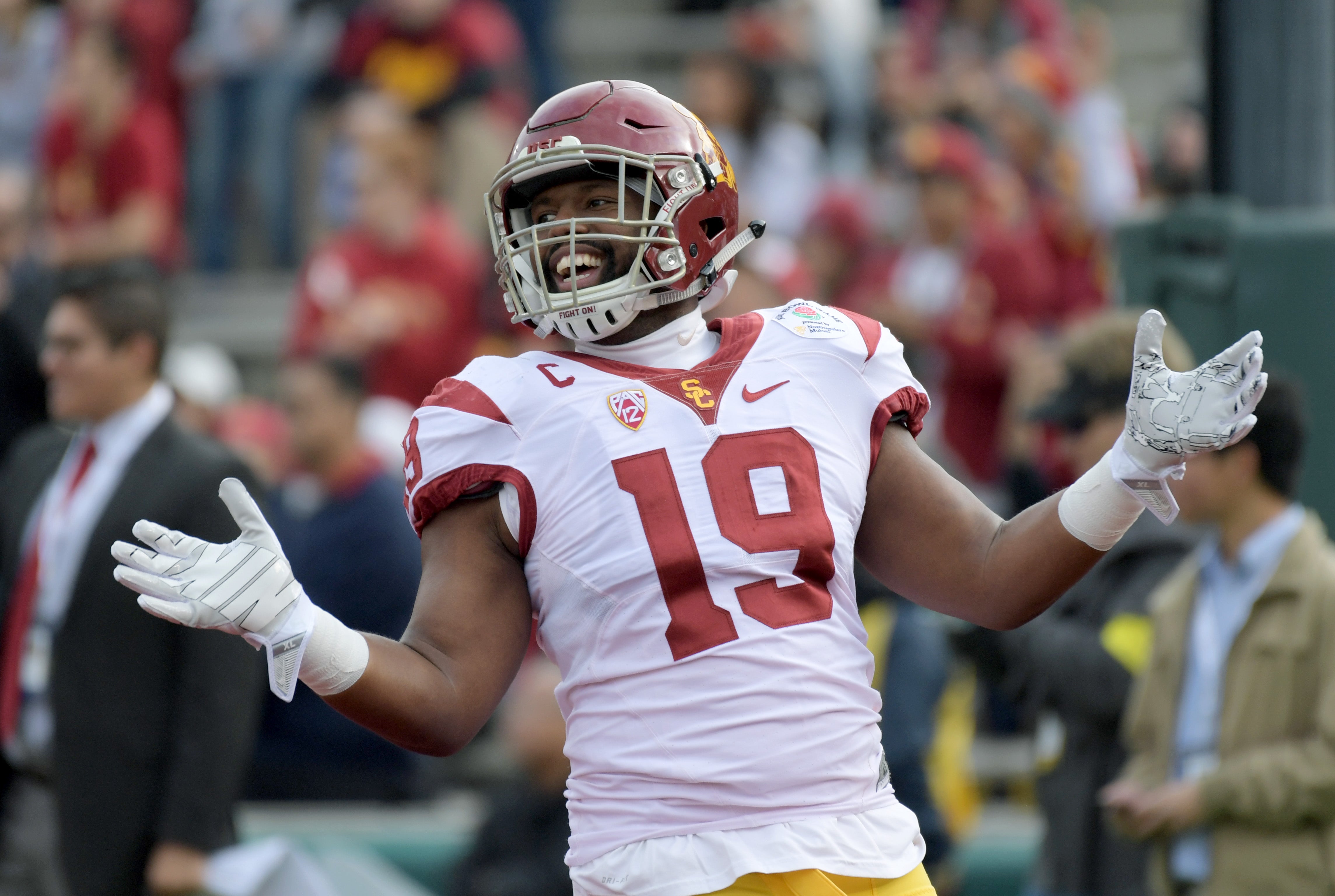 Jan 2, 2017; Pasadena, CA, USA; USC Trojans linebacker Michael Hutchings (19) smiles on the field before the game between the Penn State Nittany Lions and the USC Trojans at Rose Bowl.