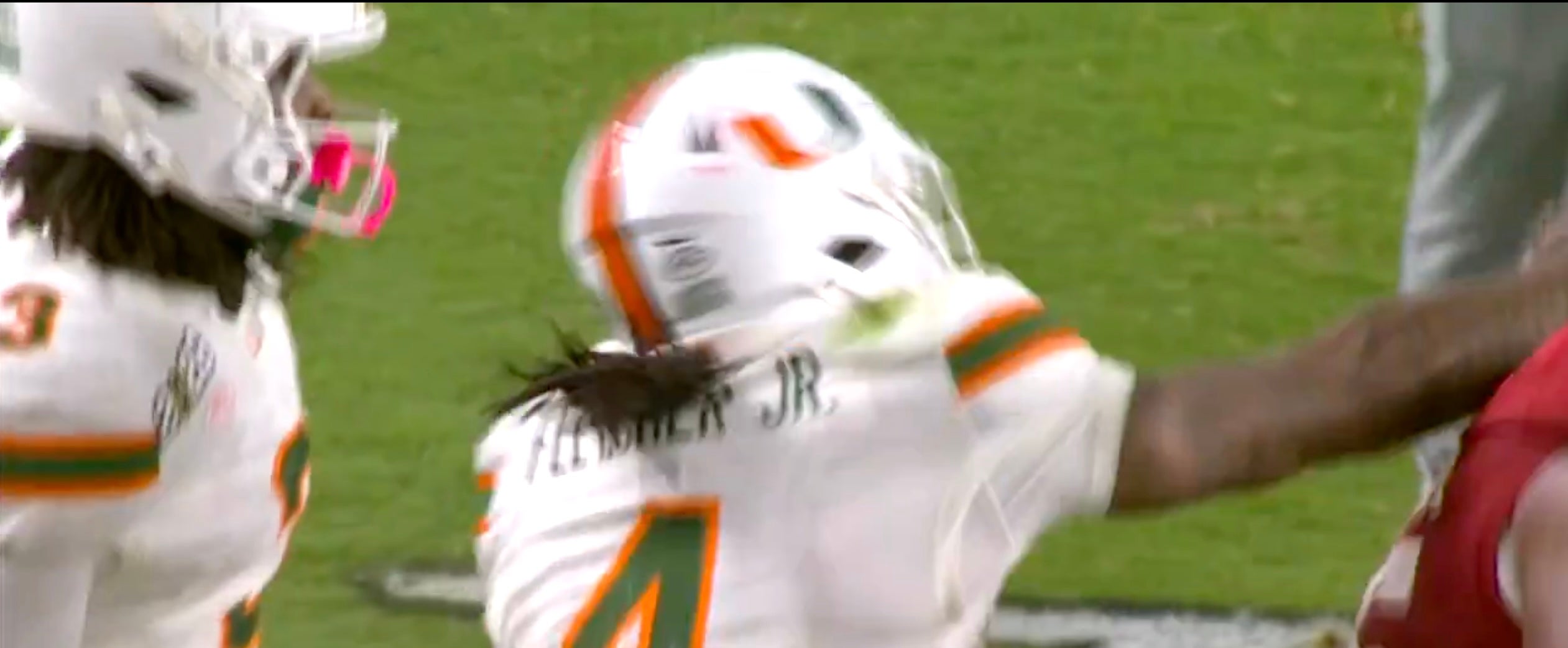 Miami Hurricanes running back Mark Fletcher takes a swing at Indiana defensive tackle Tyrique Tucker, 1/19/26.