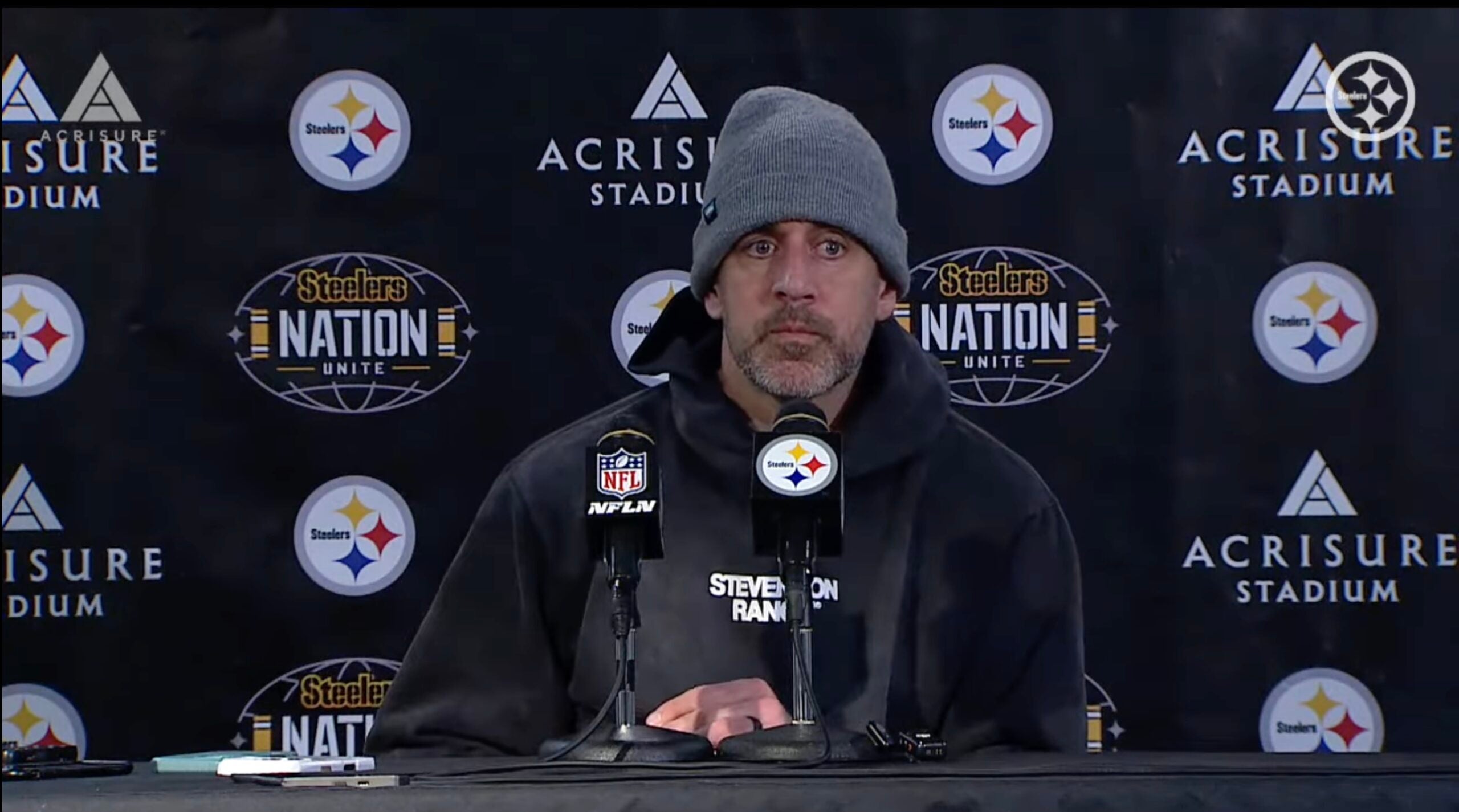 Pittsburgh Steelers quarterback Aaron Rodgers speaks to the media following 30-6 playoff loss against Houston Texans, 1/12/2026.