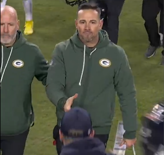 Green Bay Packers head coach Matt LaFleur greets Chicago Bears head coach Ben Johnson after the game.
