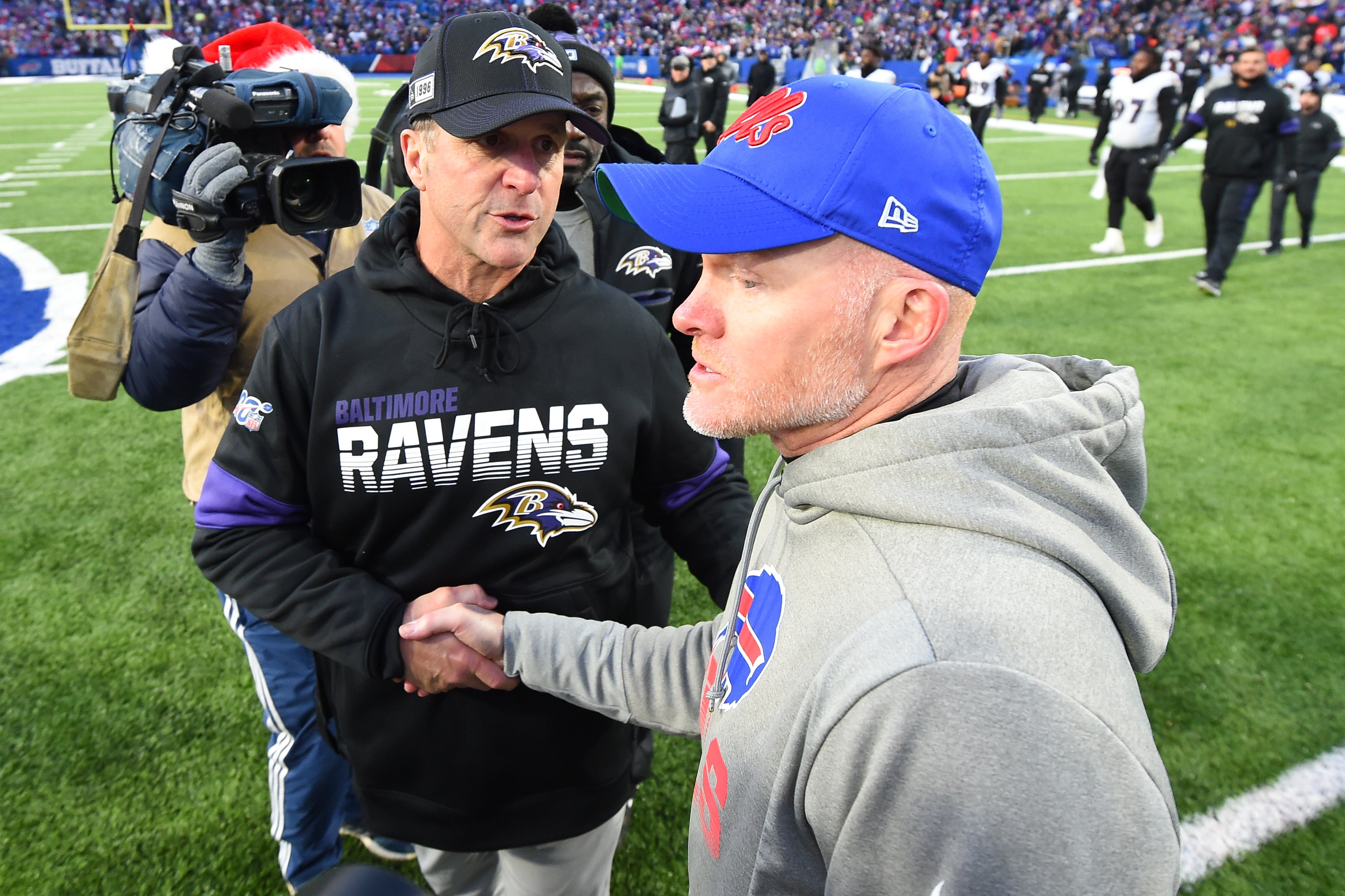 Dec 8, 2019; Orchard Park, NY, USA; Baltimore Ravens head coach John Harbaugh and Buffalo Bills head coach Sean McDermott shake hands following the game at New Era Field.