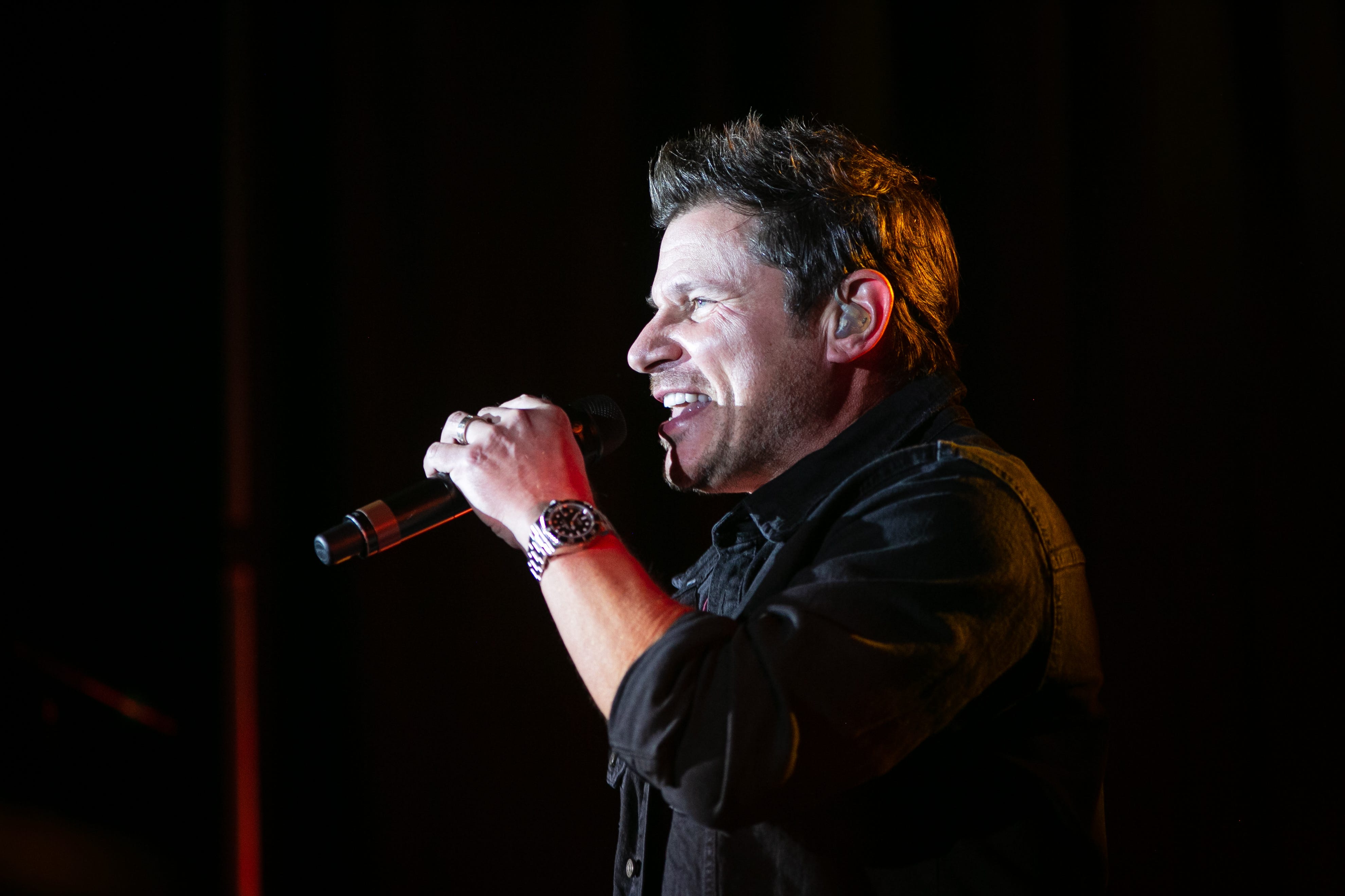 Nick Lachey performs with the band 98 Degrees, in front of a sold-out crowd at the Hard Rock Casino Cincinnati on Friday, December 17, 2021.