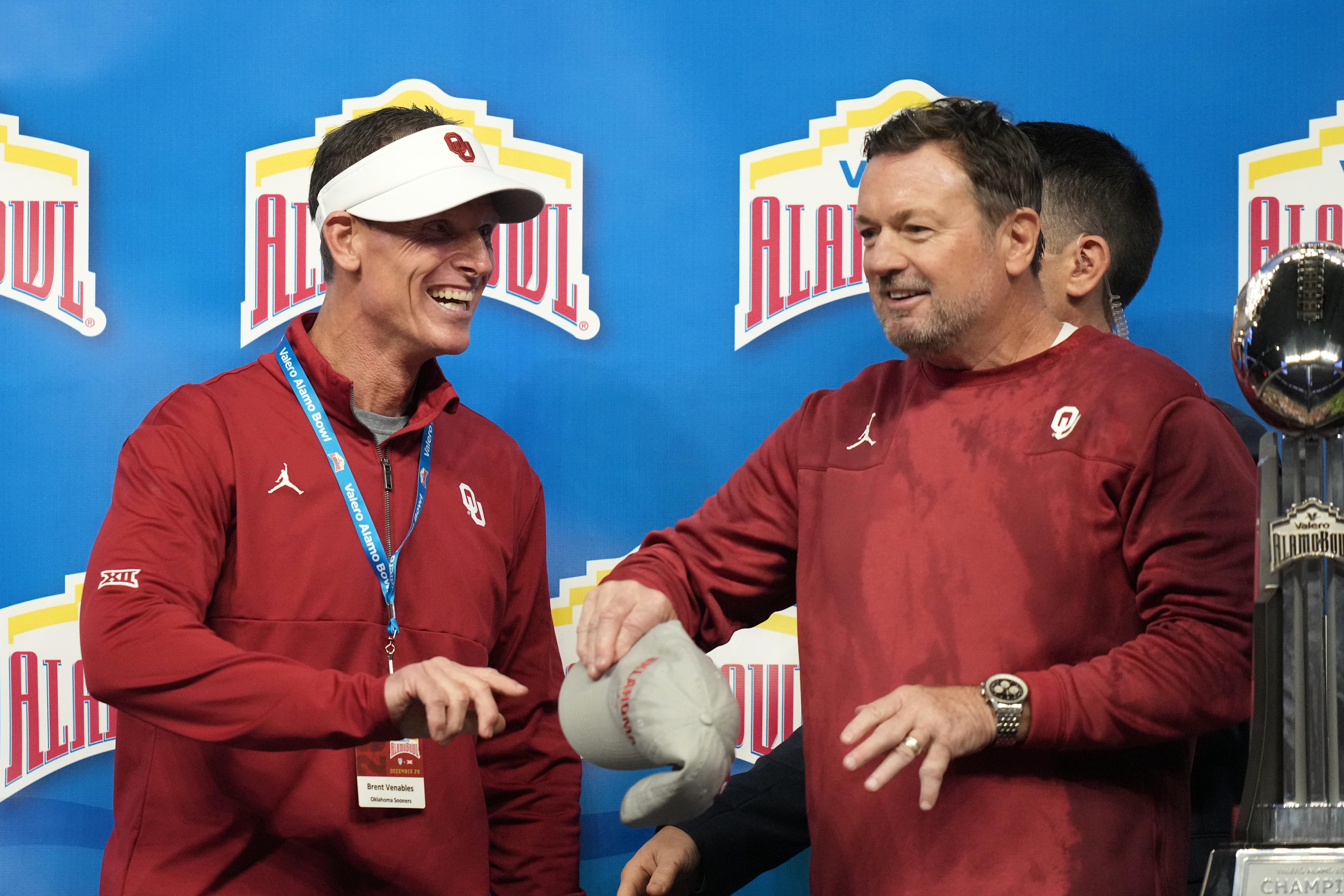 Oklahoma Sooners head coach Brent Venables former head coach Bob Stoops hire new Athletic Director Roger Denny