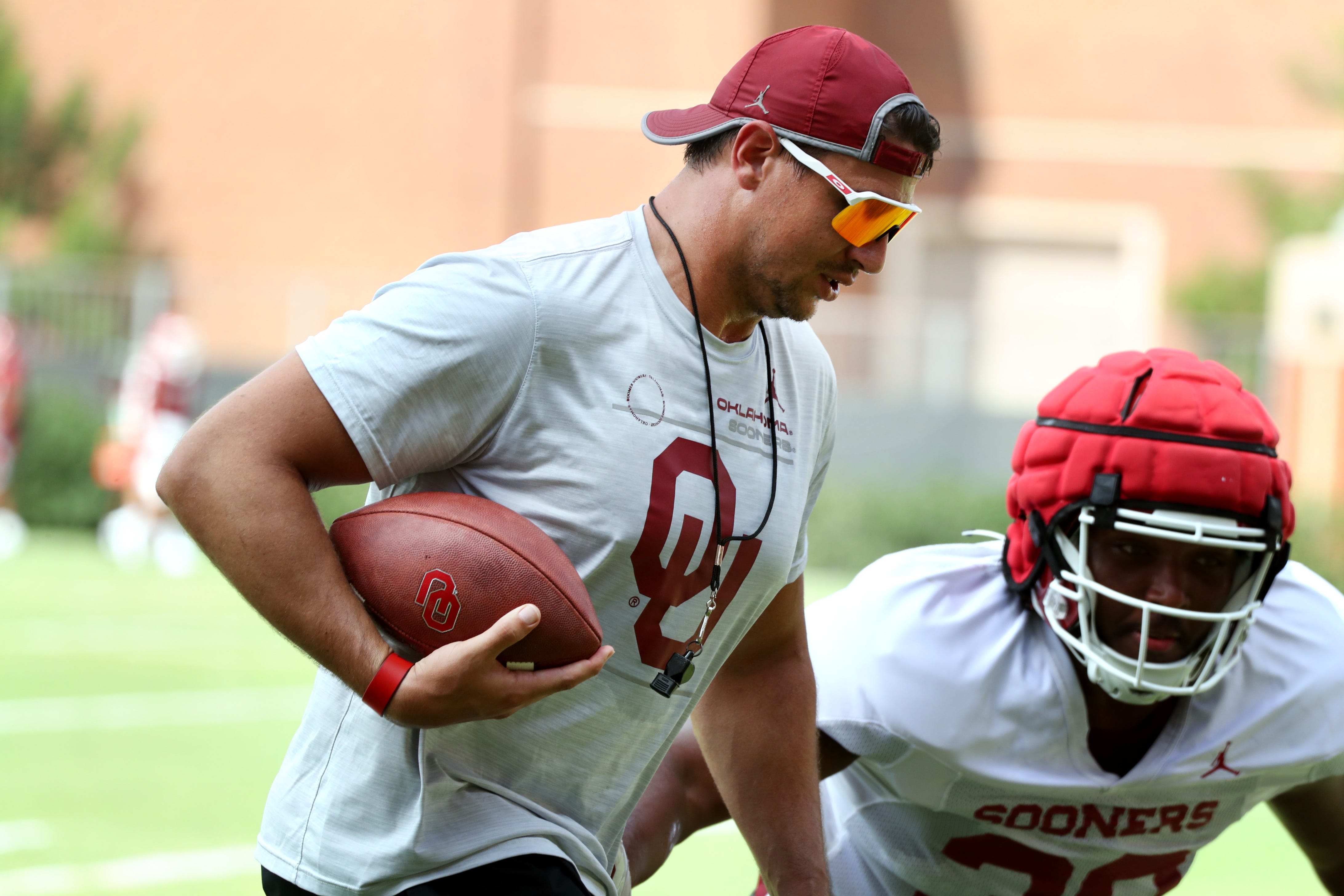 Defensive ends coach Miguel Chavis goes through drills as the University of Oklahoma Sooners (OU ) hold fall football camp outside Gaylord Family/Oklahoma Memorial Stadium on Aug. 8, 2022 in Norman, Okla. [Steve Sisney/For The Oklahoman]