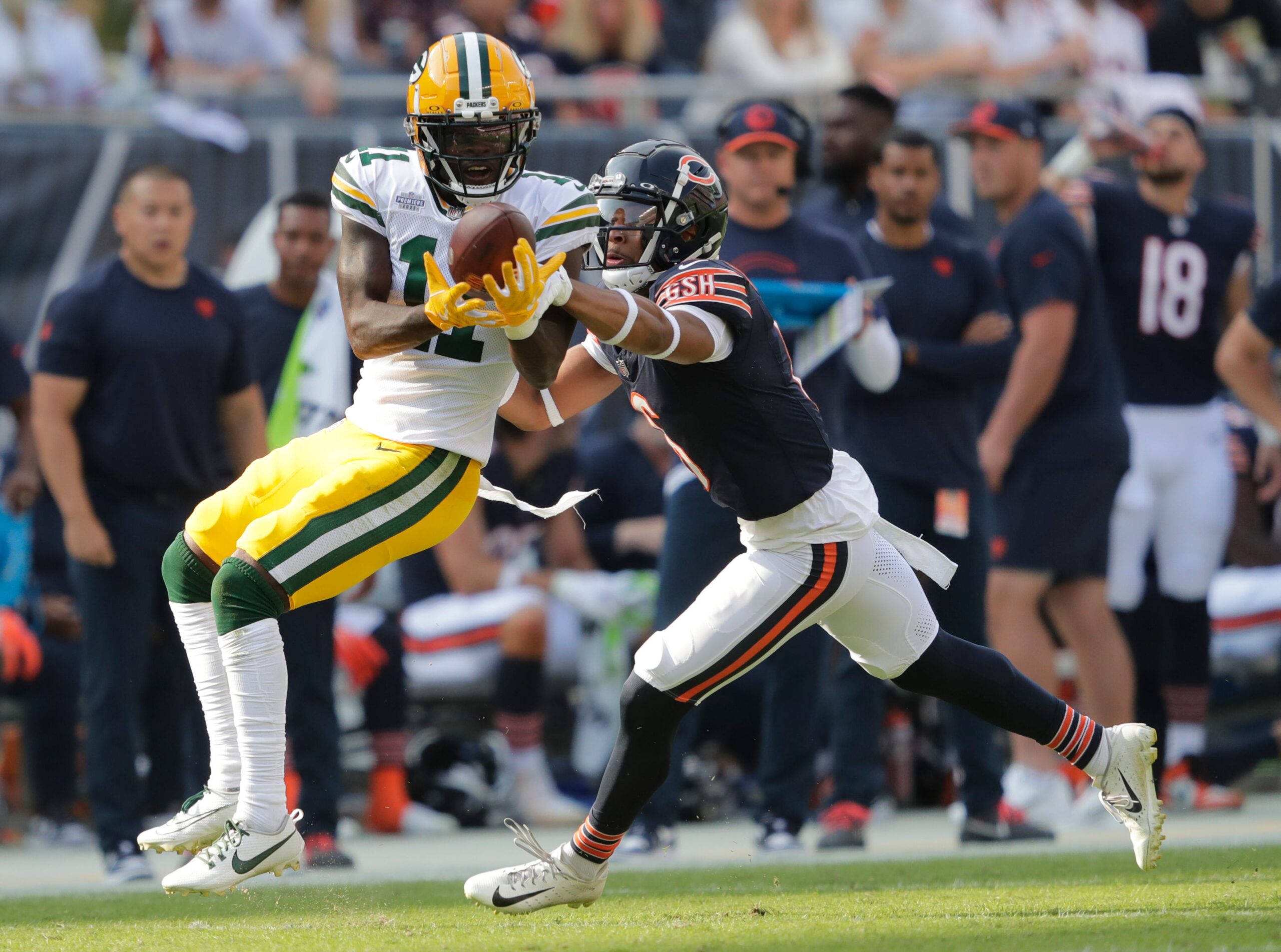 Chicago Bears cornerback Kyler Gordon (6) knocks the ball away from Green Bay Packers wide receiver Jayden Reed (11) during their football game Sunday, September 10, 2023, at Soldier Field in Chicago, Ill.