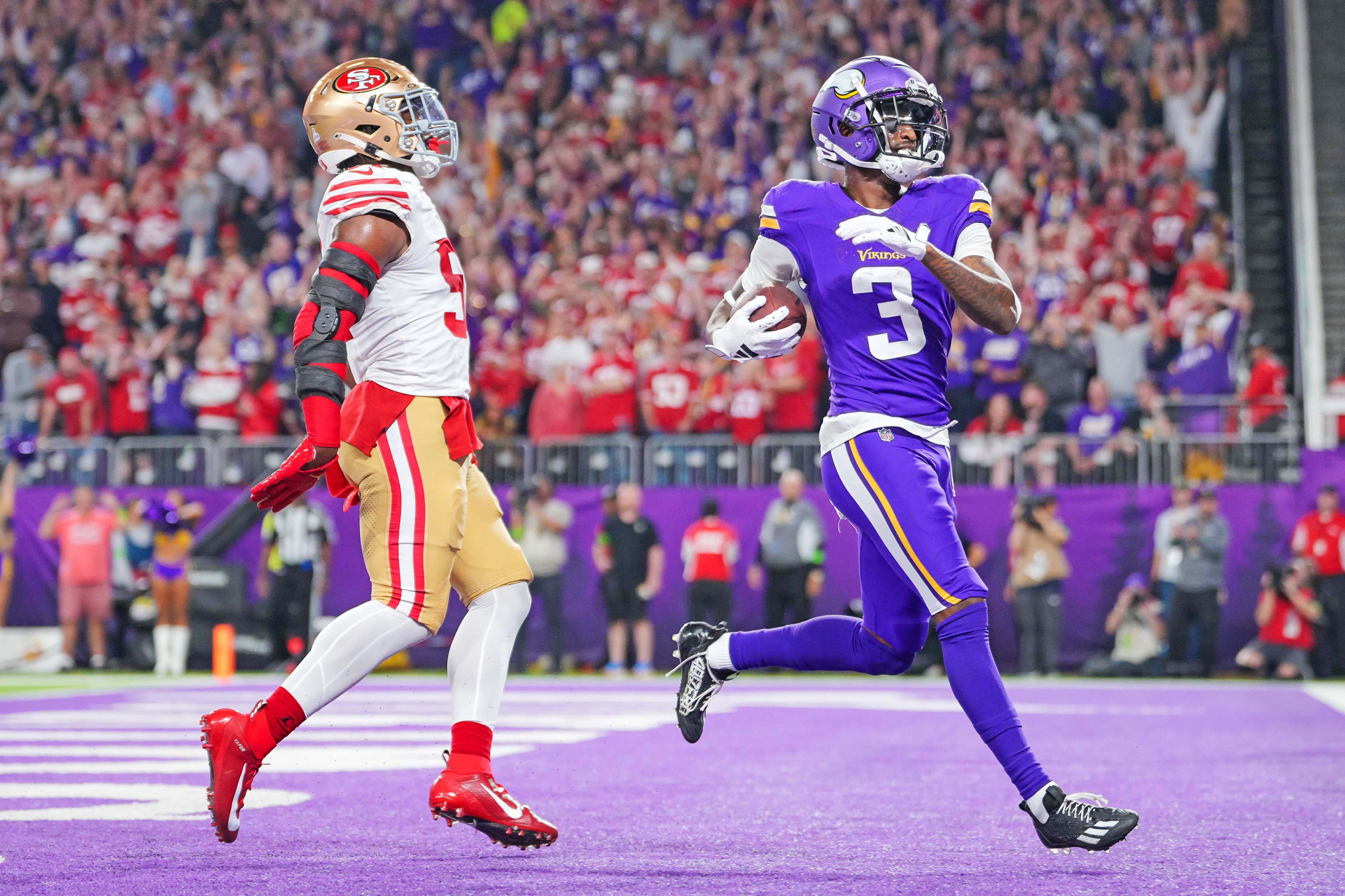 Oct 23, 2023; Minneapolis, Minnesota, USA; Minnesota Vikings wide receiver Jordan Addison (3) catches a pass for a touchdown against the San Francisco 49ers in the first quarter at U.S. Bank Stadium. M77