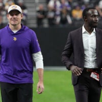 Dec 10, 2023; Paradise, Nevada, USA; Minnesota Vikings coach Kevin O'Connell (left) and general manager Kwesi Adofo-Mensah react during the game against the Minnesota Vikings at Allegiant Stadium.