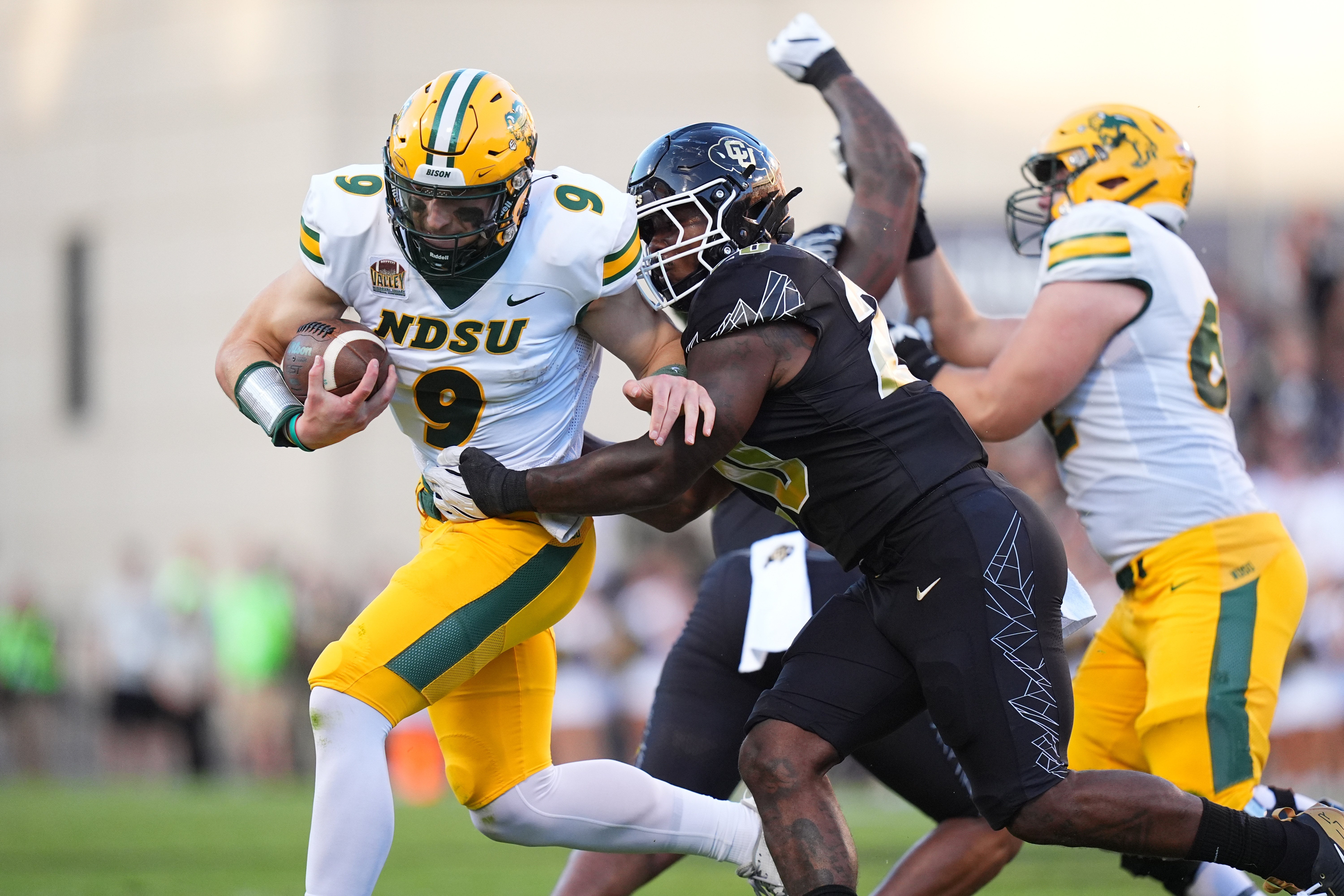 Aug 29, 2024; Boulder, Colorado, USA; Colorado Buffaloes linebacker LaVonta Bentley (20) tackles North Dakota State Bison quarterback Cole Payton (9) in the first half at Folsom Field.